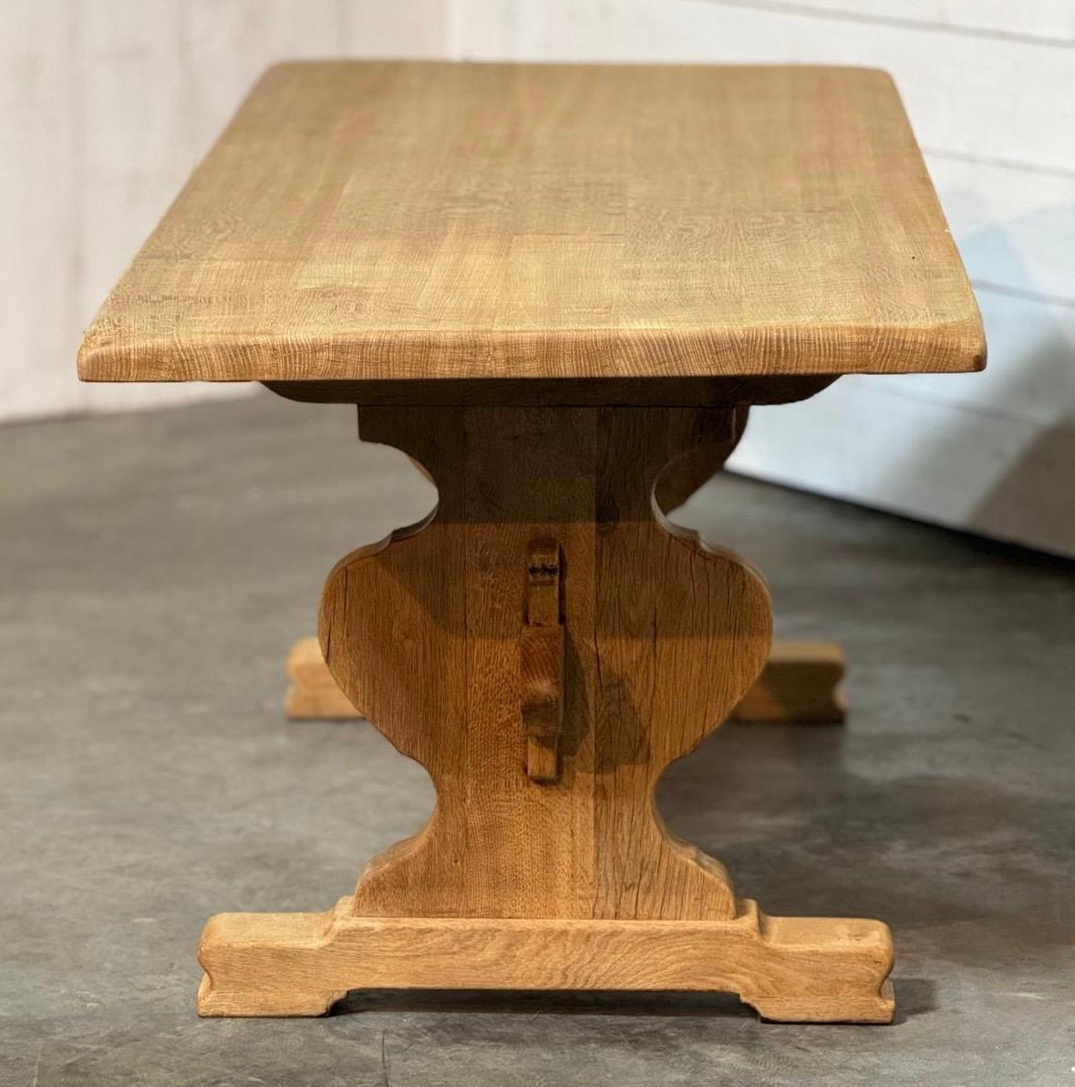 A good quality French Solid Oak Farmhouse Dining Table having trestle supports and completely comes apart for easy access into the home.
 
Dating to the early 1900s and of excellent quality construction this table will be around for generations to