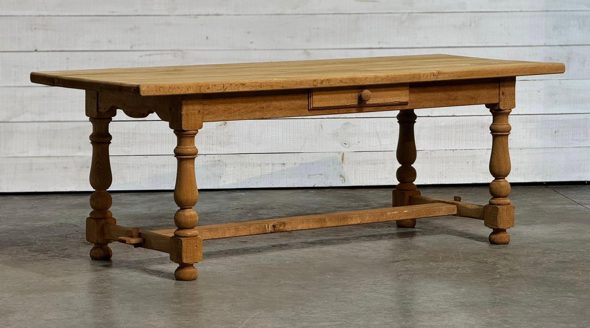 A good quality solid Oak Farmhouse Kitchen Dining Table having a drawer to one side. French in origin dating to the early 1900s and of excellent quality construction this table will be around for generations to come. We have bleached it for a