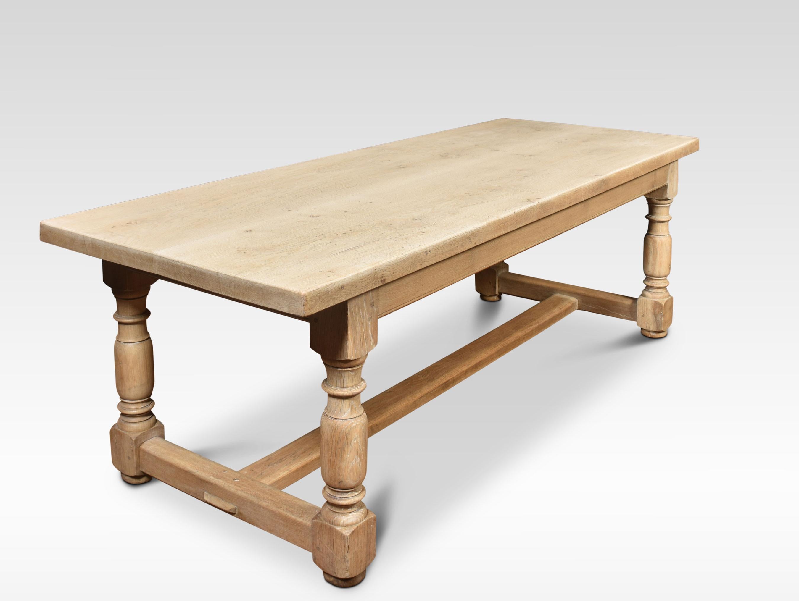 Bleached oak refectory table. The large rectangular plank top, raised on four turned supports united by an H stretcher.
Dimensions
Height 29 Inches height to rail 23.5 Inches
Width 82 Inches
Depth 32 Inches.