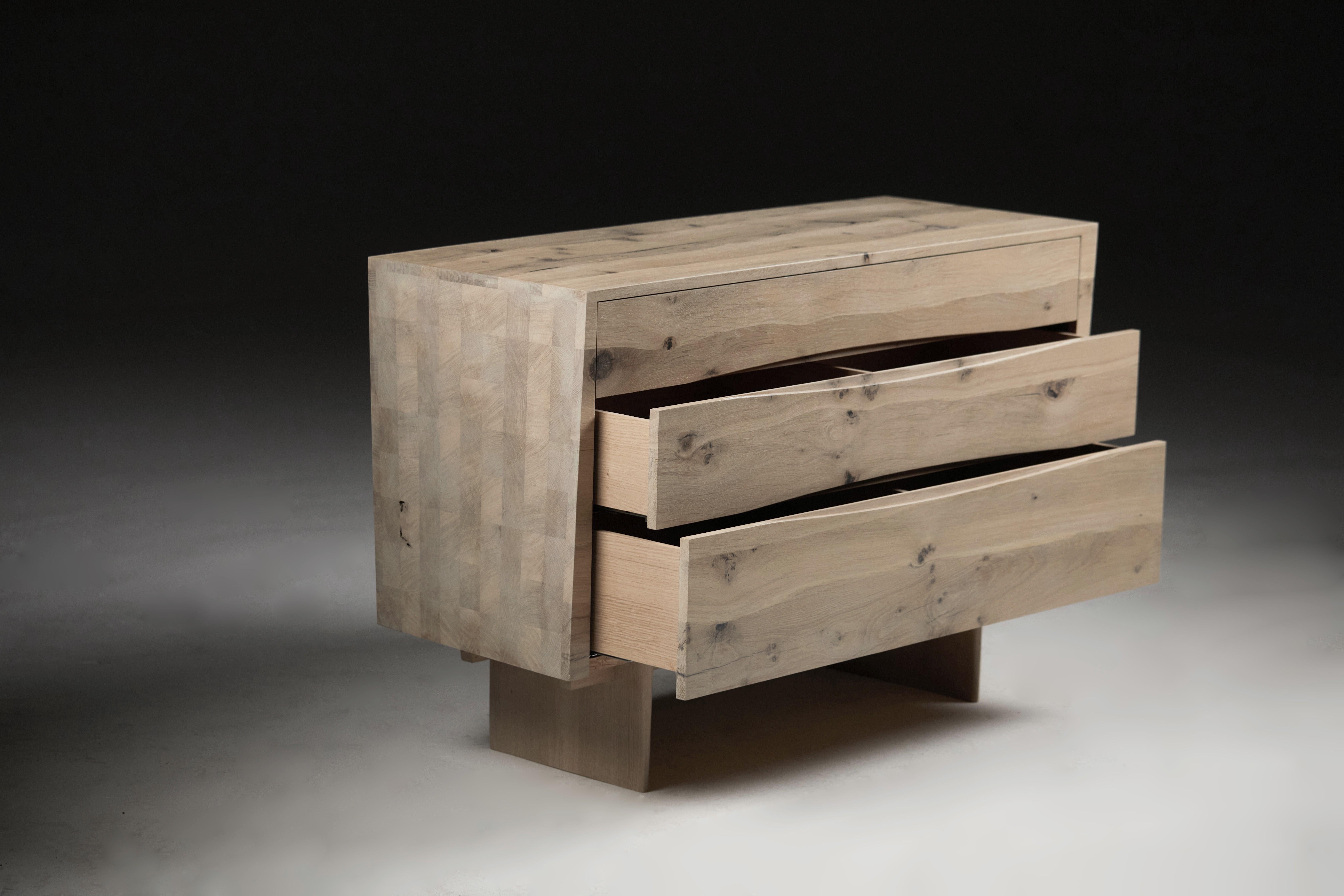 English Bleached oak side chest of drawers with asymmetrical sides by Jonathan Field For Sale