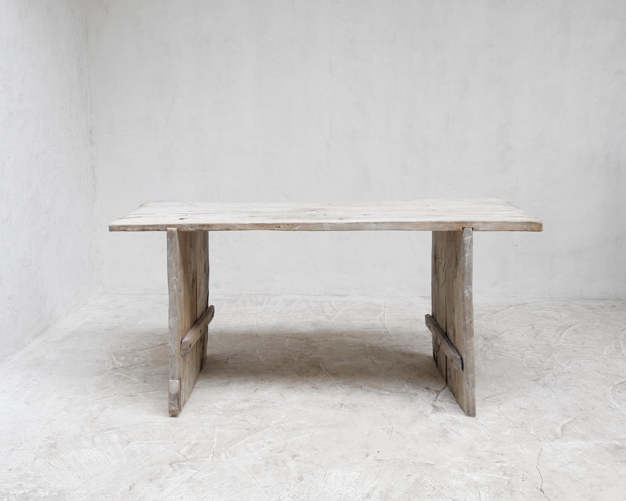 A bespoke bleached-out slab table built by us in our London workshop.

The table was assembled using rare 18th/19th C. Continental beech boards.

Only by using 18th/19th C. material we can showcase the unique surface and texture revealed by