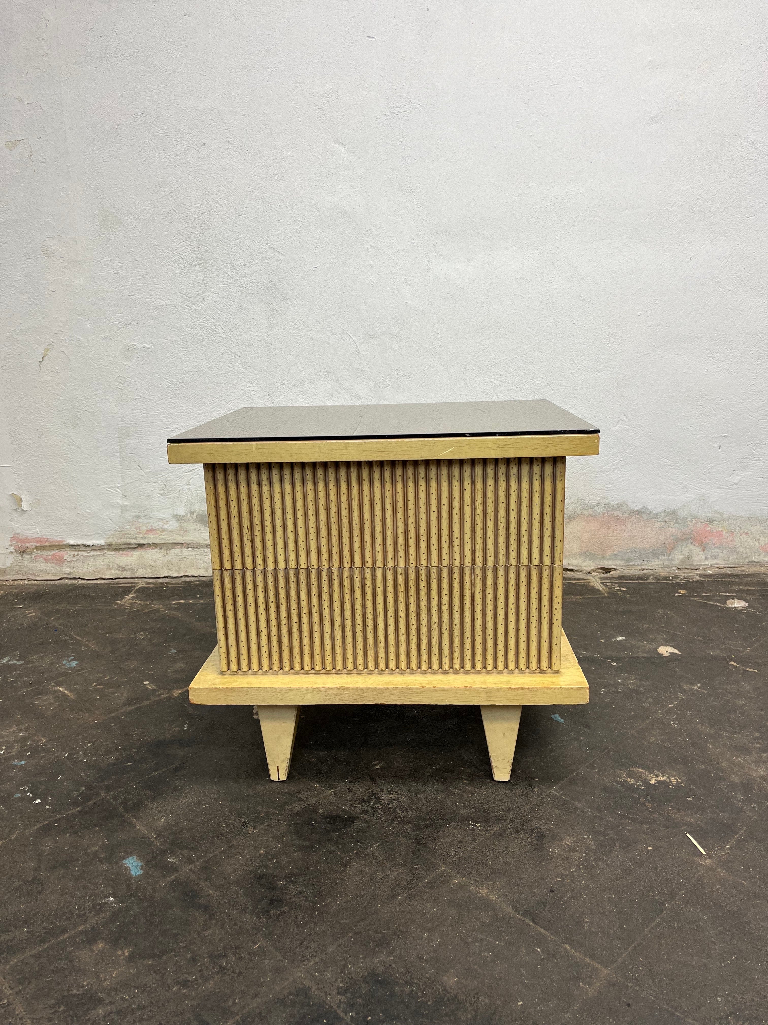 
Beautiful midcentury architectural nightstand in original bleached Philippine mahogany with reeded drawer fronts by American of Martinsville, circa 1950s. It's all about the details. Low profile, high design. Bleached mahogany original finish. A