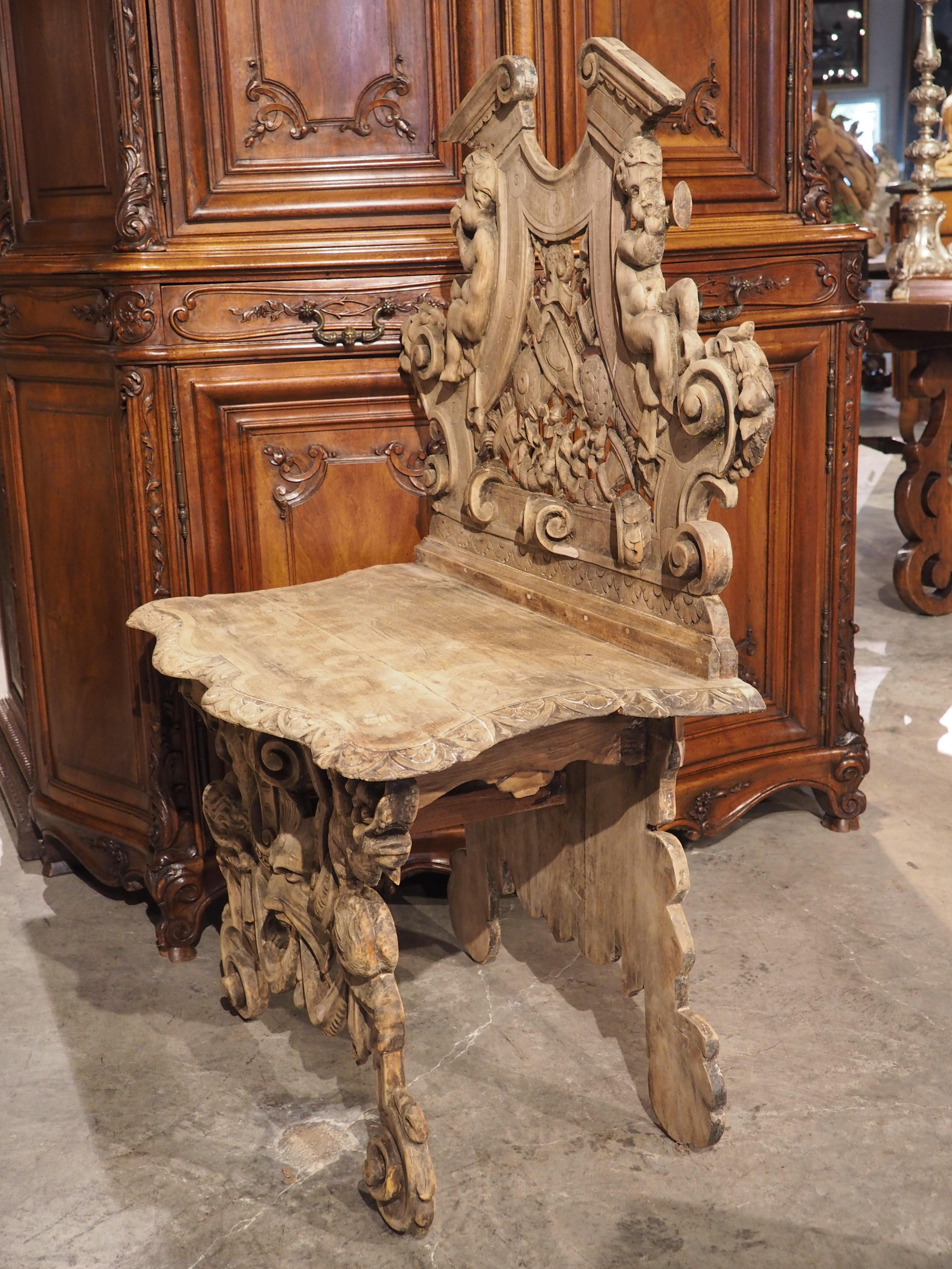 A sgabello is an Italian chair that originated in the Renaissance. Originally designed to be displayed in a hallway (like a French side chair), sgabello were typically highly carved with some sort of familial crest or coat of arms incorporated into