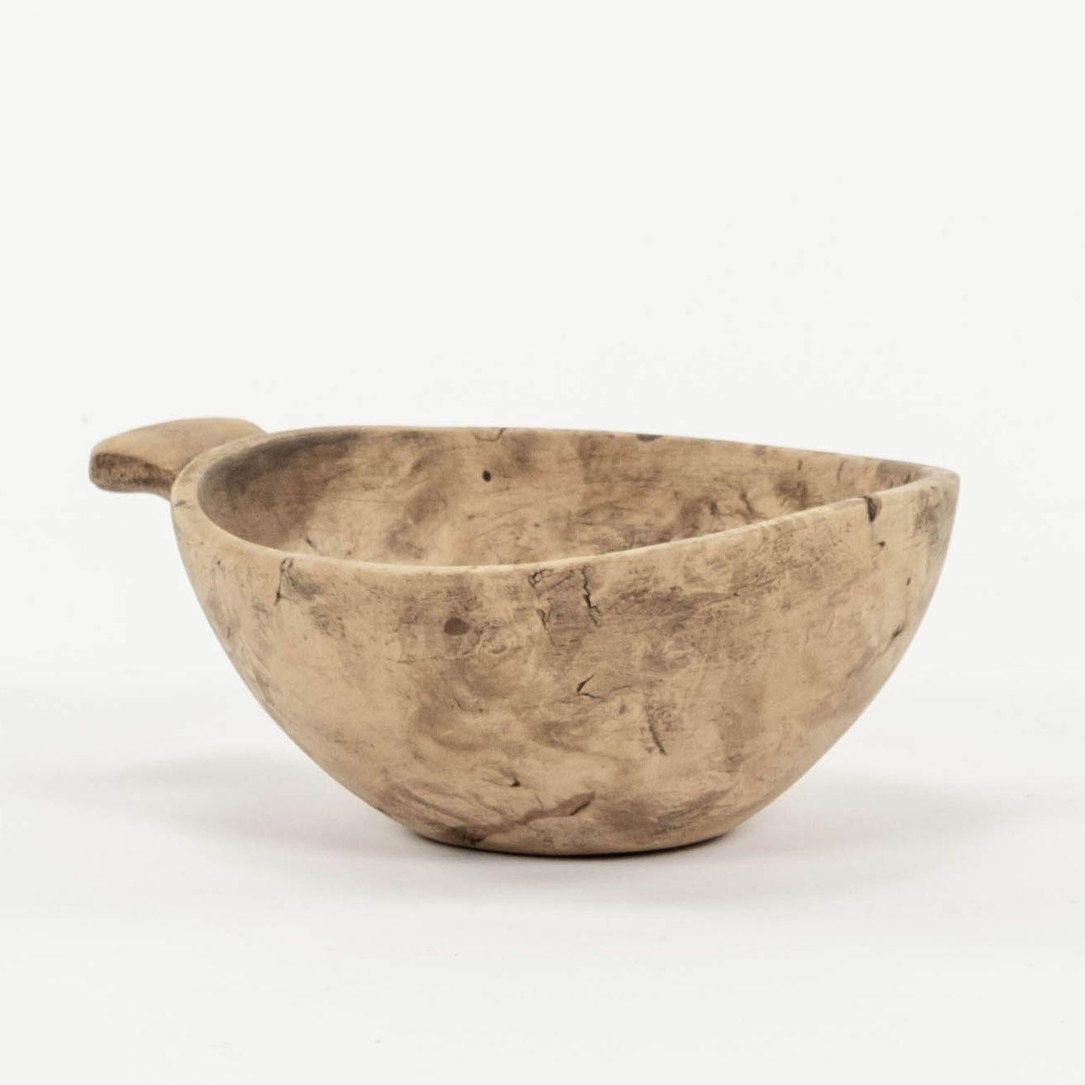 Bleached Swedish Lapland ale bowl with handle. Hand-carved sycamore with scrubbed surface.

Note: Original/early finish on antique and vintage metal will include some, or all, of the following: patina, scaling, light rust, discoloration, and