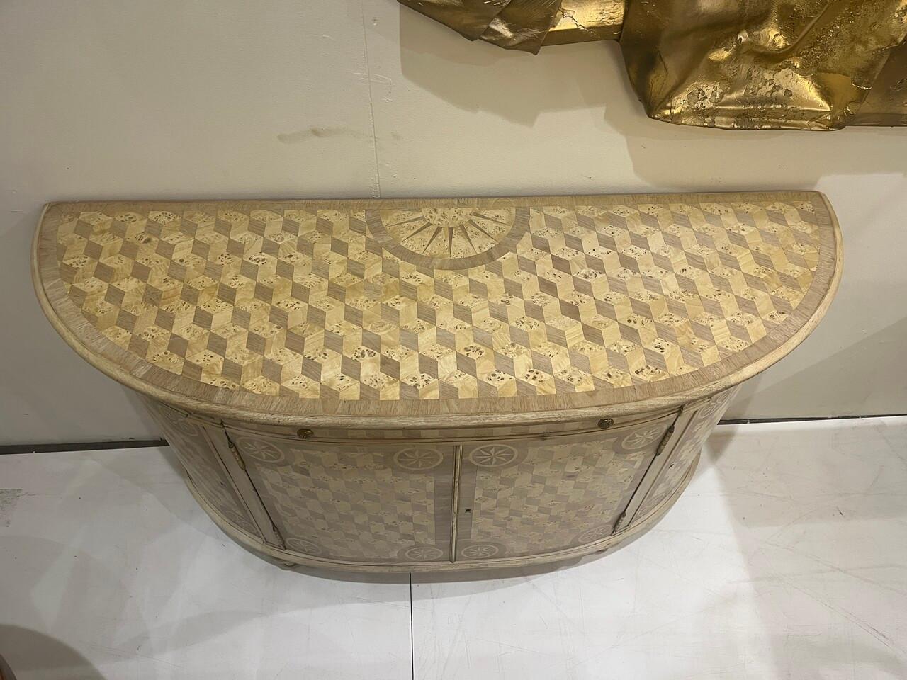 Bleached Theodore Alexander Demilune Cabinet. Has beautiful inlay work done. Item has been bleached and is ready to place.