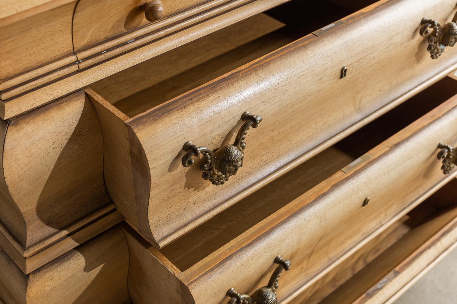 This bleached walnut Italian commode is in pristine condition with no flaws. It truly is a one of a kind piece! It has 4 drawers. Two of the drawers have heavy solid aged hardware. Each drawer has a key hole, but we do not have any keys.