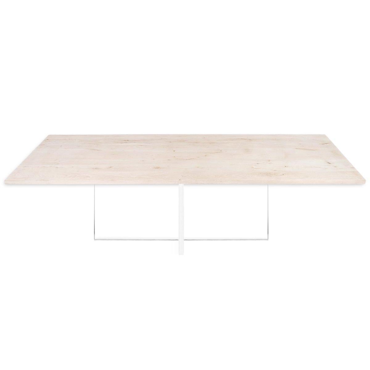 Featuring a plank walnut top with clean cut edges, our Malibu table is bleached and finished with a satin sealer making it durable and great for high use. The modern and minimal pedestal criss cross base is made of thick clear Lucite. 
Dimensions:
