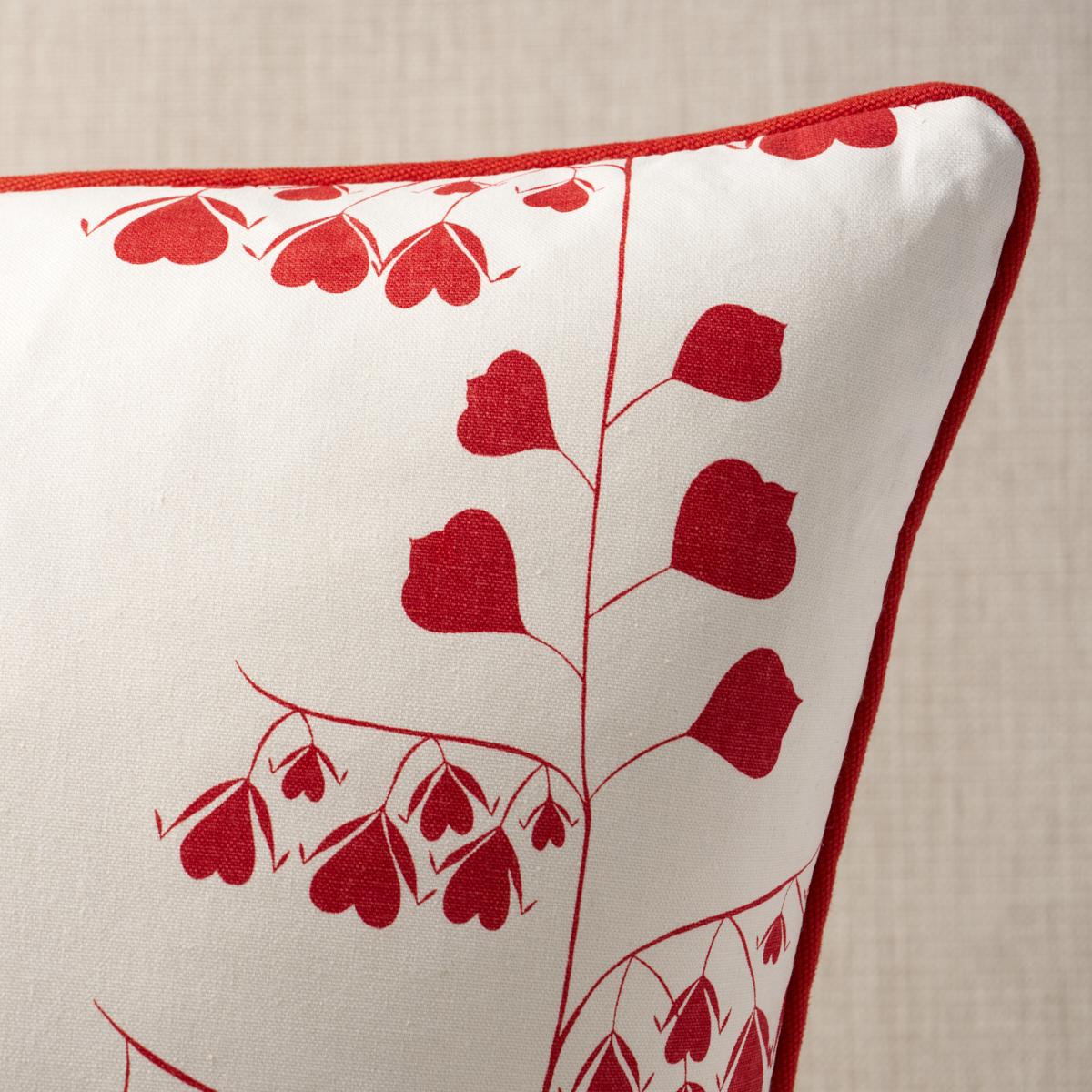 This pillow features Bleeding Hearts by Peg Norriss. Bleeding Hearts derives its delicate floral motif from a painting by artist Clare Rojas. Clean and contemporary, graphic and fresh, this stylized print is a versatile medium-scale design that is