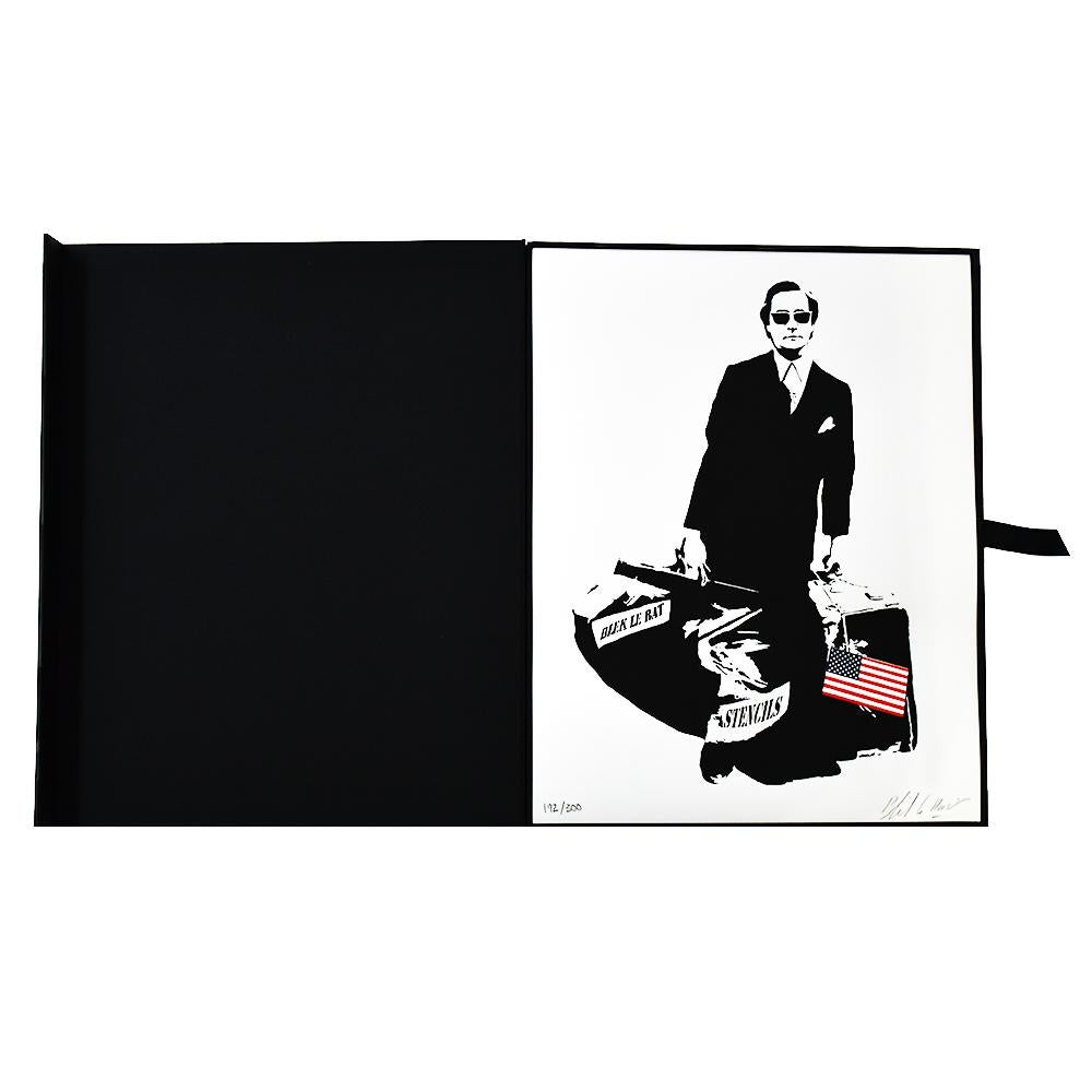 Wonderful Special Edition of Blek Le Rat The Man Who Walks Through Walls.
Comes complete with Screenprint, custom box and Blek Le Rat’s book, Getting Through The Walls.
Self portrait by Blek Le Rat carrying bag of stencils with the USA flag.
Limited