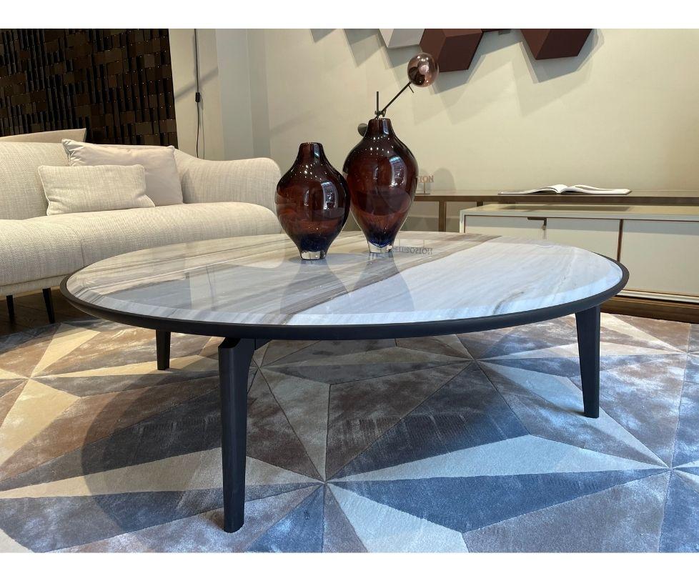 Designed By Carlo Colombo

A combination of harmonious colors for Blend low table, between fine and exclusive materials.

The low table in ash wood is finished off with marble top.

Finishes: Zebrino Marble Top - Fin. 93