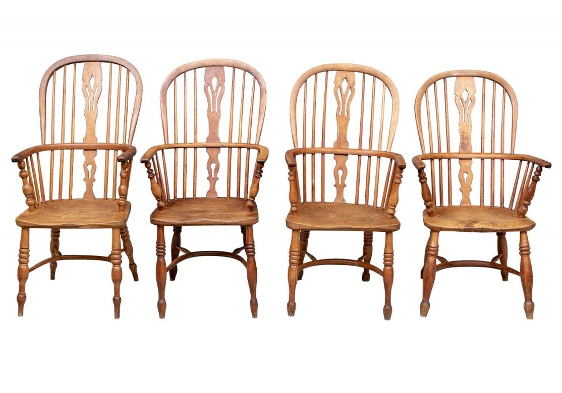 Rustic Blended Set of 8 Complimentary Semi Antique Hardwood Windsor Armchairs For Sale