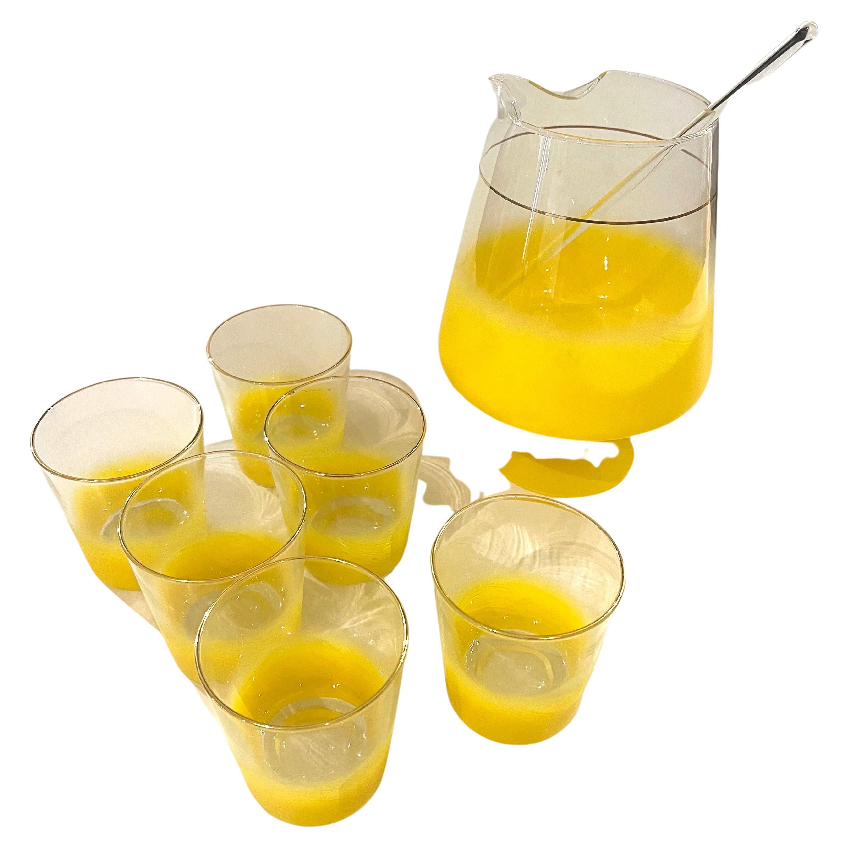 Mid Century American blown glass and 22-karat gold drinks set of six by, Blendo. The set features a frosted 