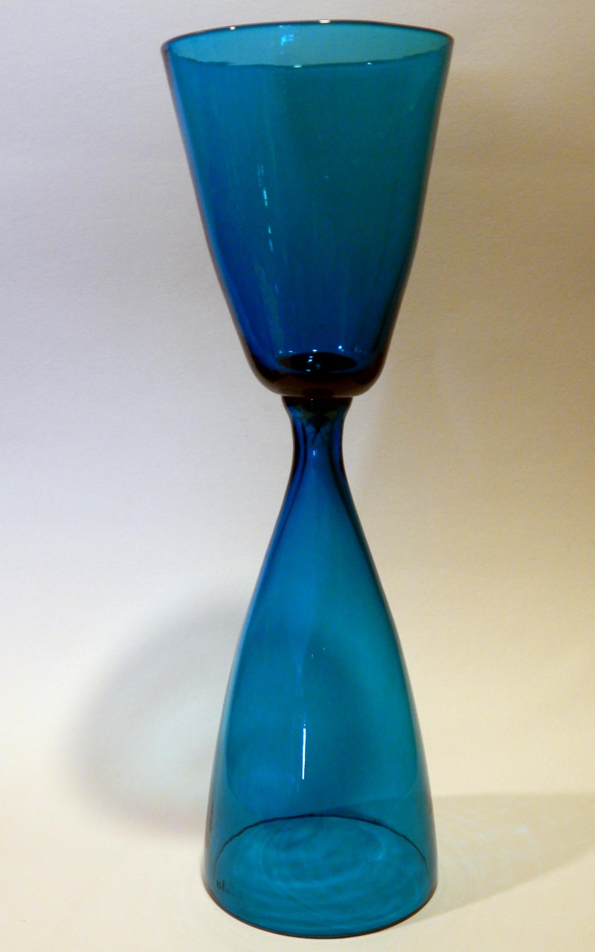 Blenko glass double chalice form vase in blue.
Excellent condition with no damage or chips of any kind.
Measures: 19 ½