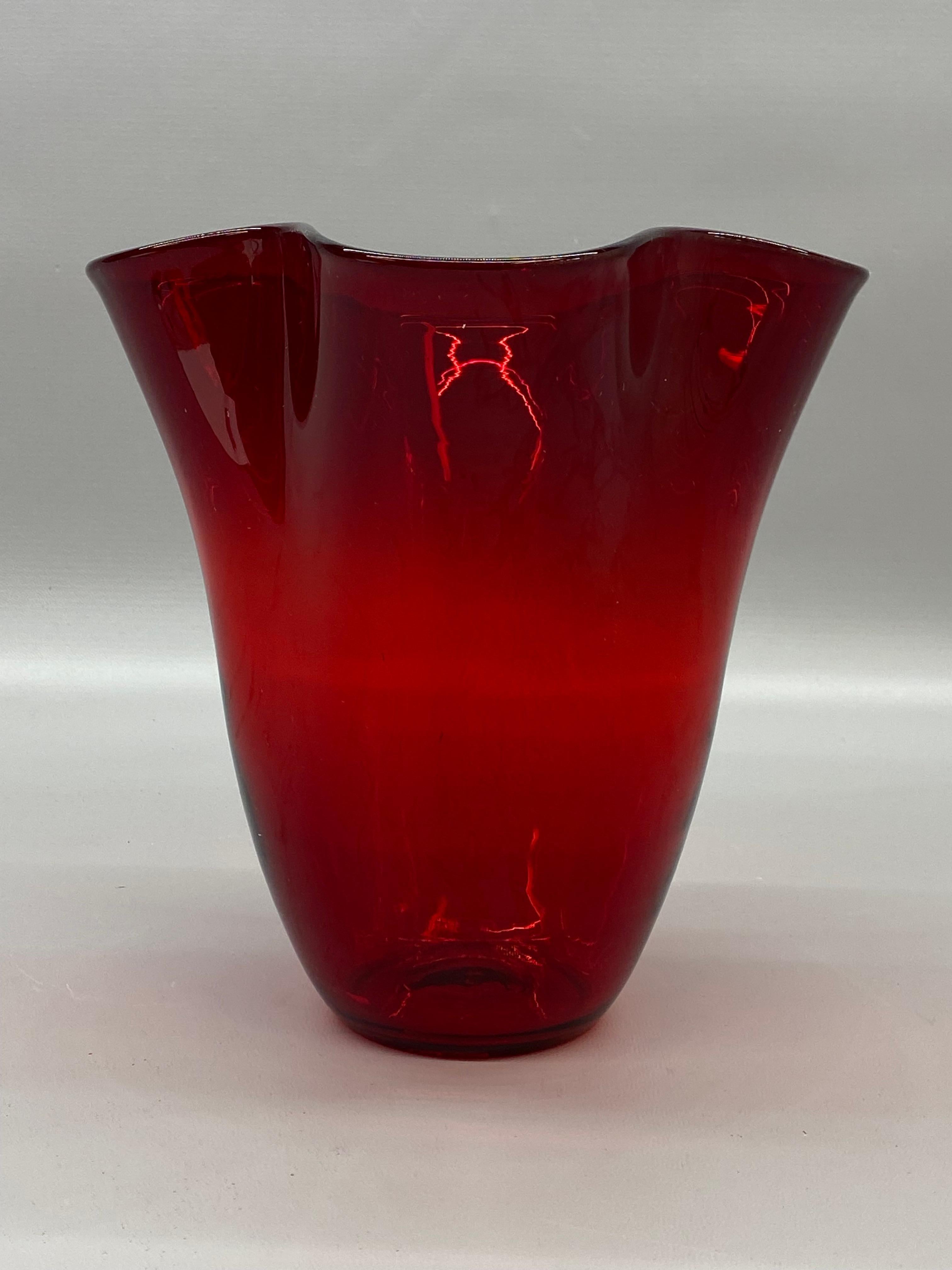 Vintage ruby red ruffled edge Blenko vase, shape 404. A beautiful deep, saturated red with a wavy edge. Circa 1950-50. Nipped pontil. This piece comes from an avid and incurable glass collector in Ridgefield, CT.

Good overall condition with no