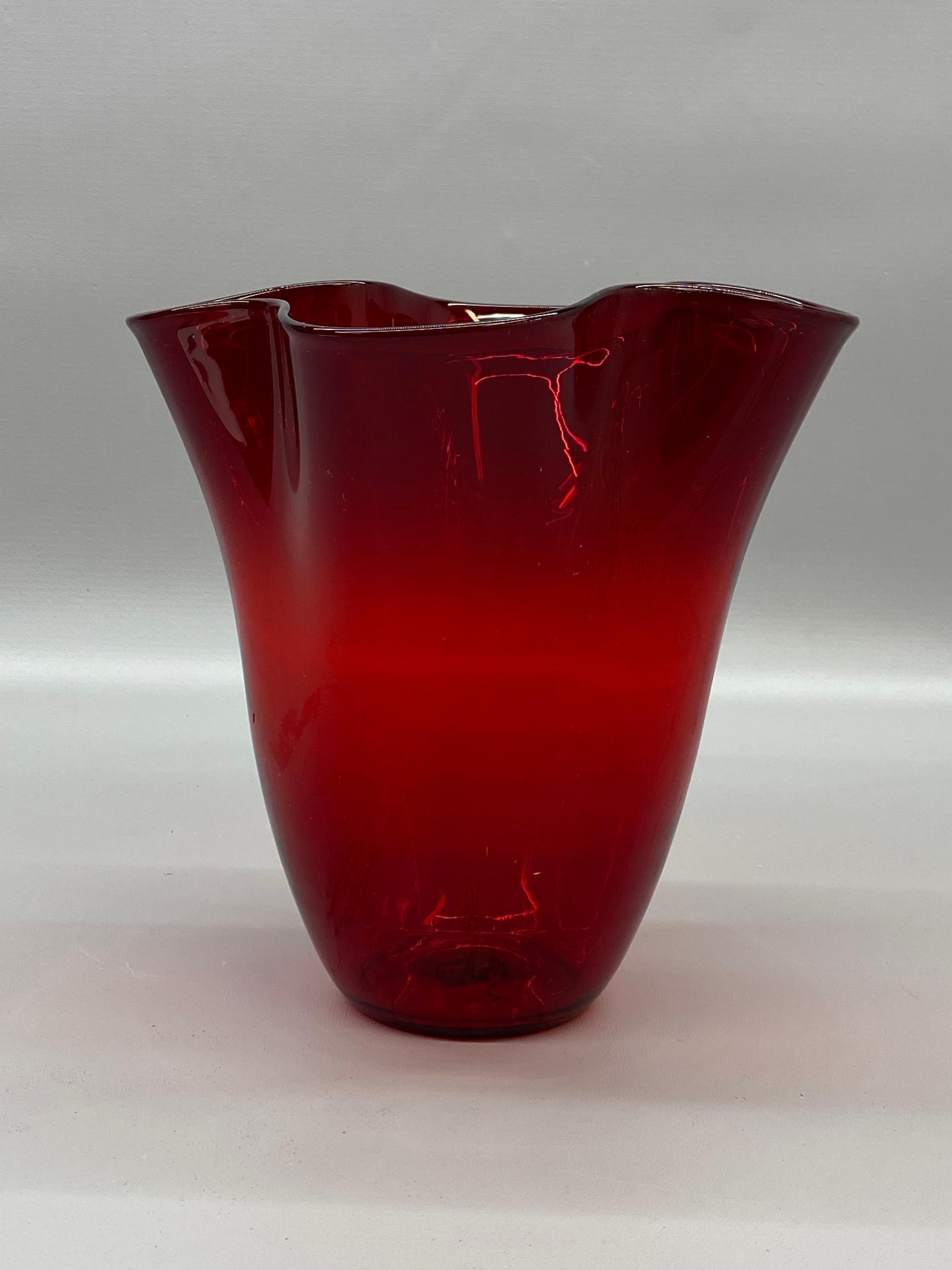 Vintage ruby red ruffled edge Blenko vase, shape 404. A beautiful deep, saturated red with a wavy edge. Circa 1950-50. Nipped pontil. This piece comes from an avid and incurable glass collector in Ridgefield, CT.

Good overall condition with no