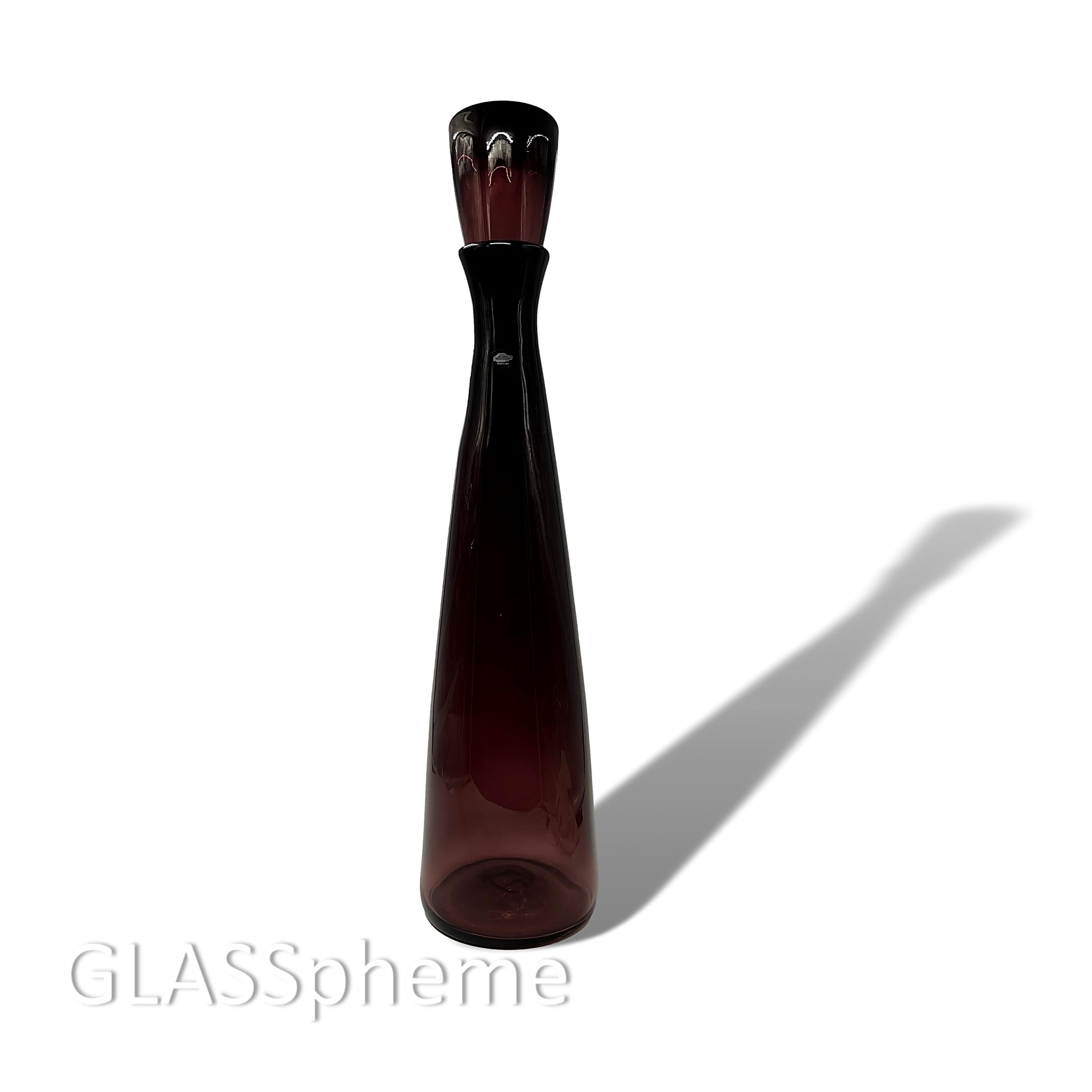 The clean modern lines of Blenko's #6138 architectural decanter, designed by Wayne Husted for the 1961 catalog, made it so sustainably popular that Blenko produced it for the whole of the 1960s and the 1970s. And then, around a quarter of a century