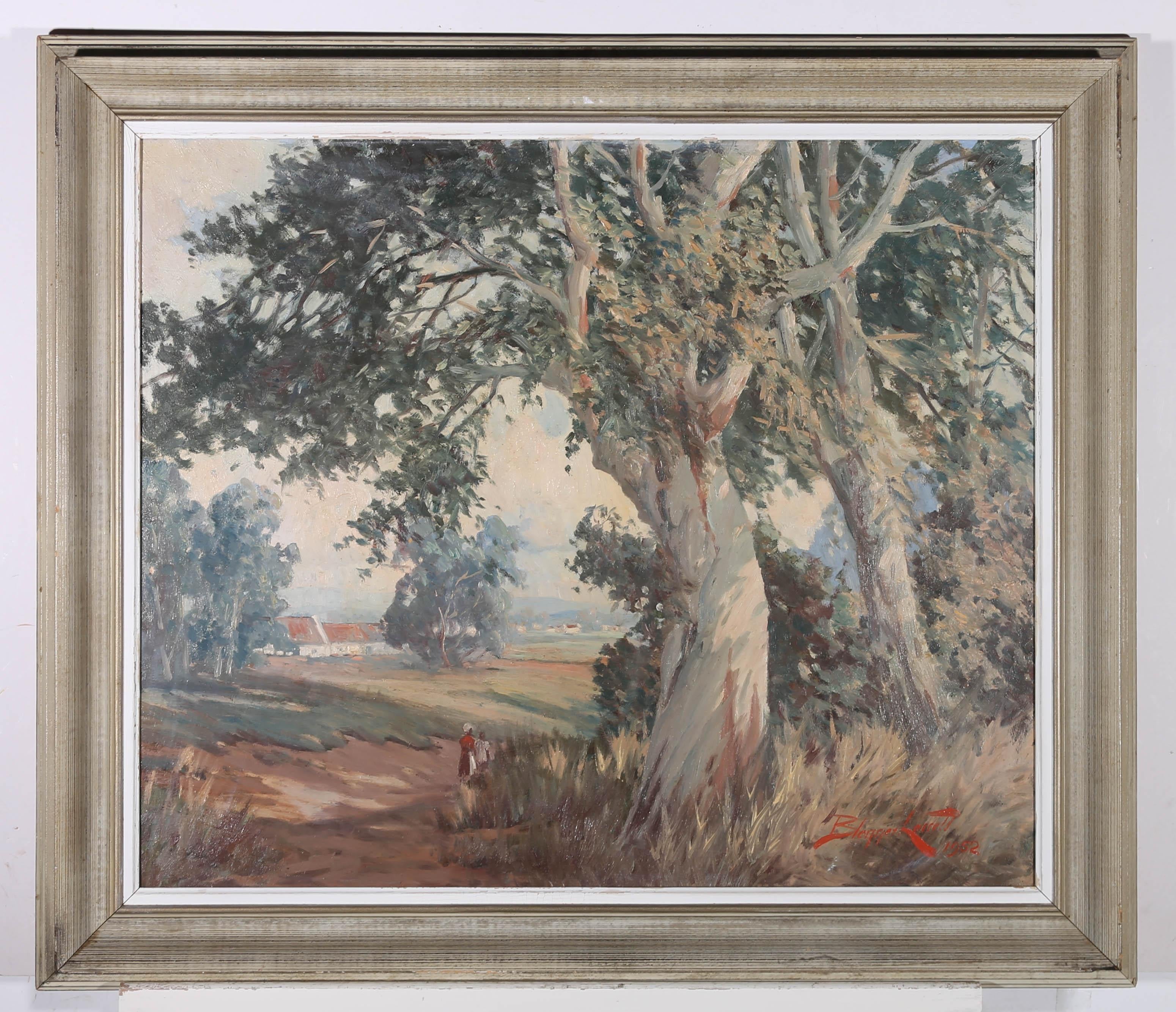 Un paysage idyllique du milieu du siècle montrant une journée d'été à la campagne avec deux personnages se promenant à l'ombre des arbres à la périphérie d'un village. L'artiste a signé et daté en bas à droite et le tableau est présenté dans un