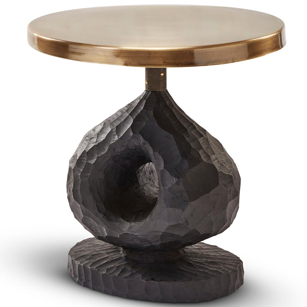 This side table is part of our Blessing collection.
Blessing is an artist from Zimbabwe who came to us in the most serendipitous way, he came to South Africa looking for better opportunities where we discovered him carving the most beautiful angels