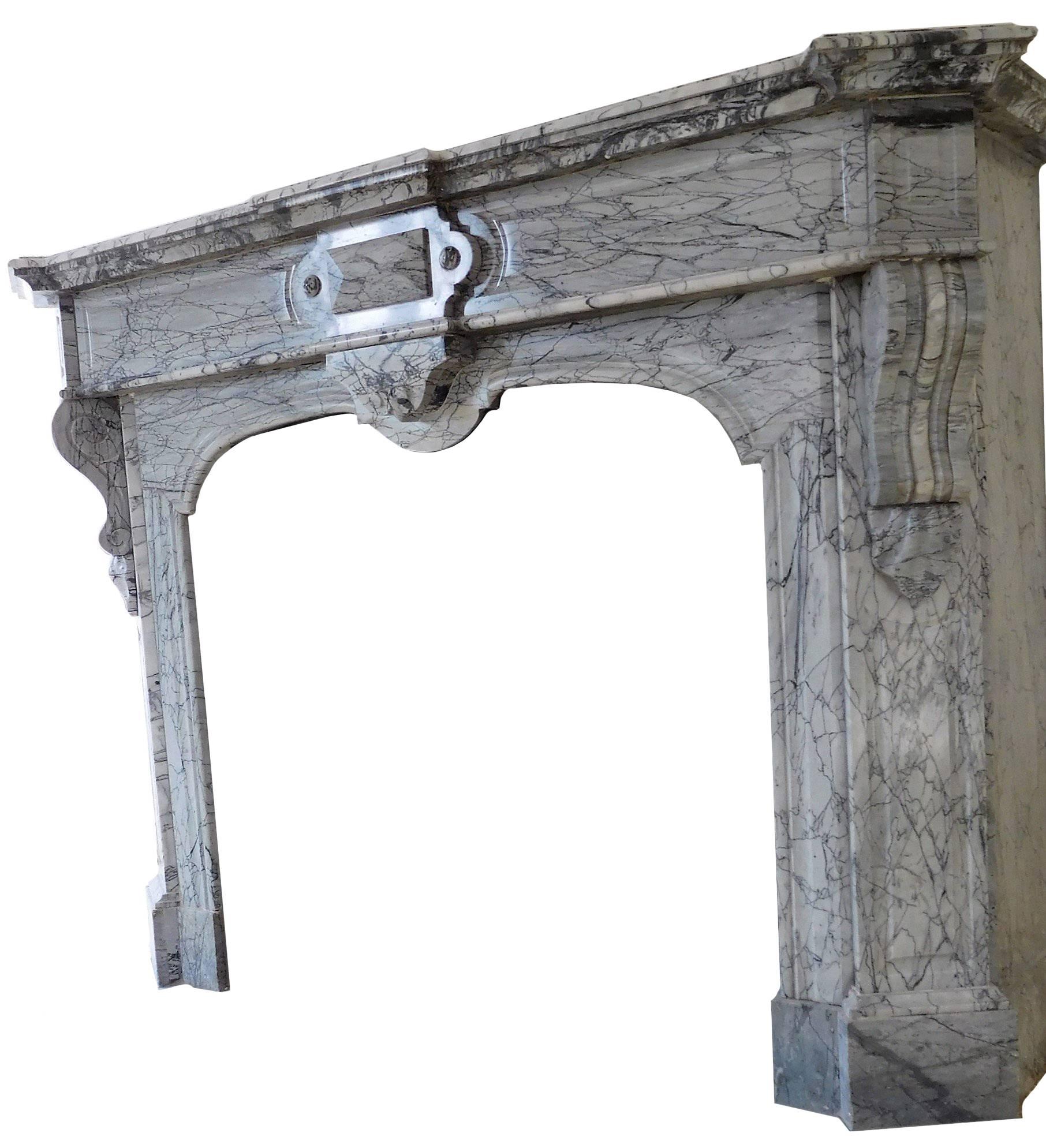 A Napoléon III chimneypiece, finely shaped in soft-toned grey-bleu, so named 