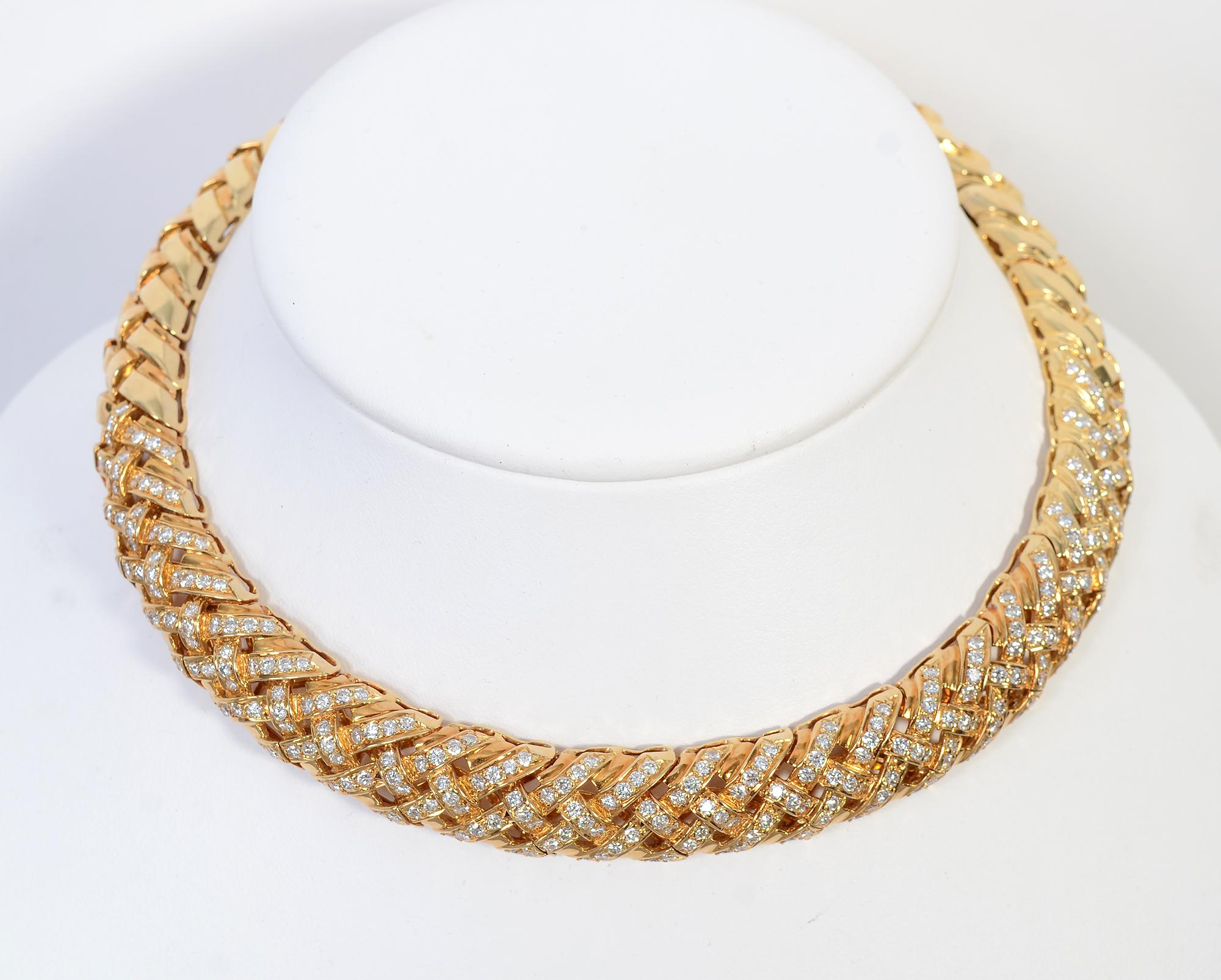 This elegant choker necklace was made by New York bespoke jeweler, Jerry Blickman. The firm has been in business since 1946 and is known for the exceptional quality of their designs and gems.
This 18 karat latticework design choker is studded with