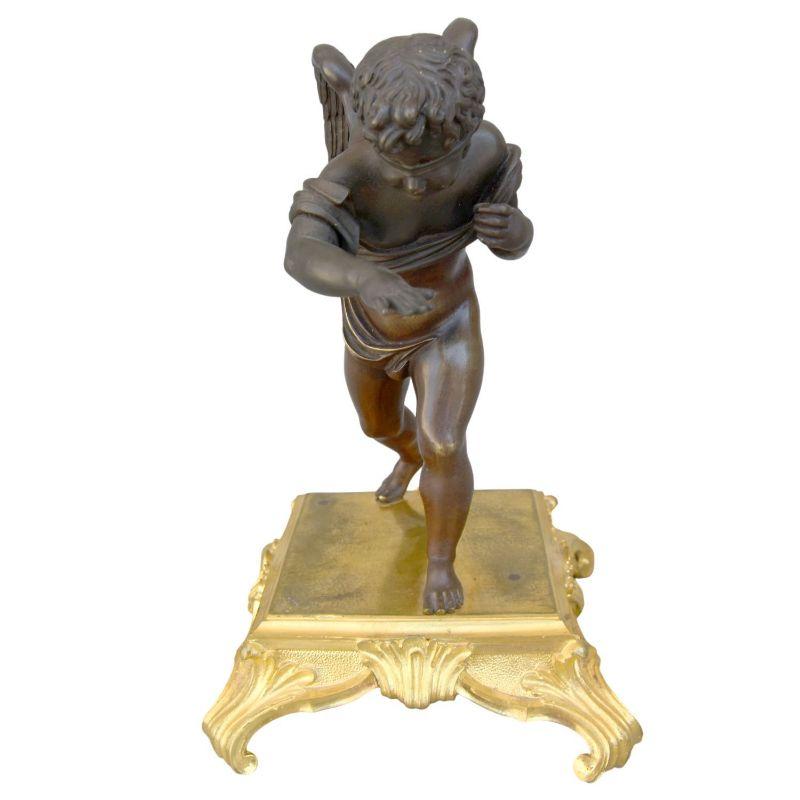 Nineteenth-century bronze blind love symbolized by a cupid looking like a day blind man with a brown patina on a gilded bronze base. note a difference in patina between the upper part and the lower part of the angel Dimension height 25 cm for a size