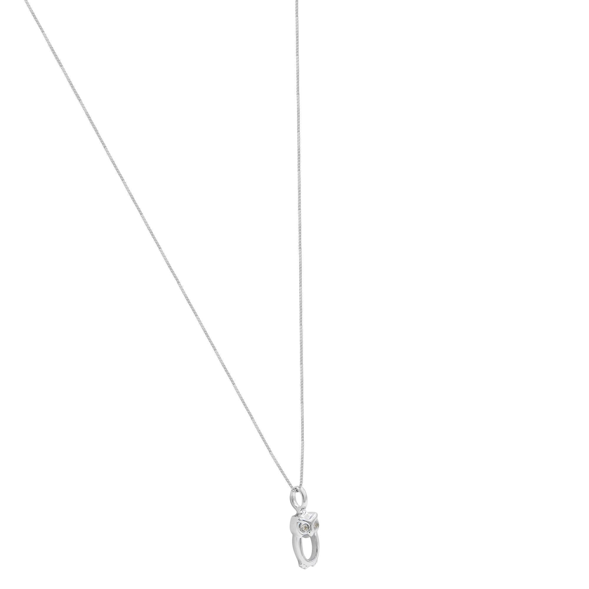Whimsical white-gold pendant
Diamond accent stones
Total diamond weight: 0.01 carat
Cut: round
Color: G–H
Clarity: VS1–VS2
18K white gold
Polished finish
18” box chain
Spring-ring clasp
Pendant dimensions:
Owl: 3/8”x3/16”
