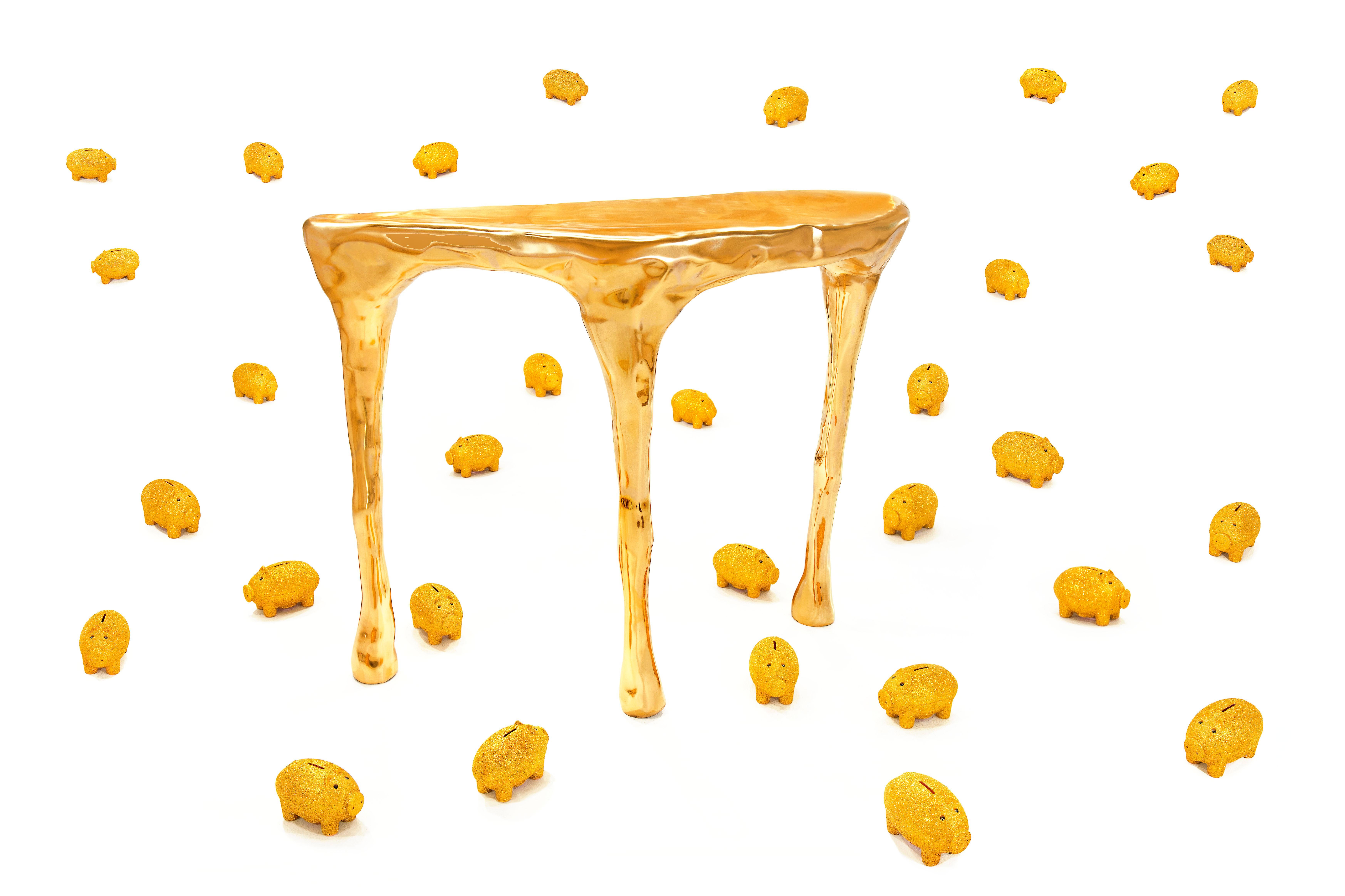 Bliss Console in Brass by Scarlet Splendour is a console table with versatile functionality. Its rich texture and color combine traditional techniques in pure brass with contemporary amorphous sculpting.

The Fools' Gold Collection of amorphous