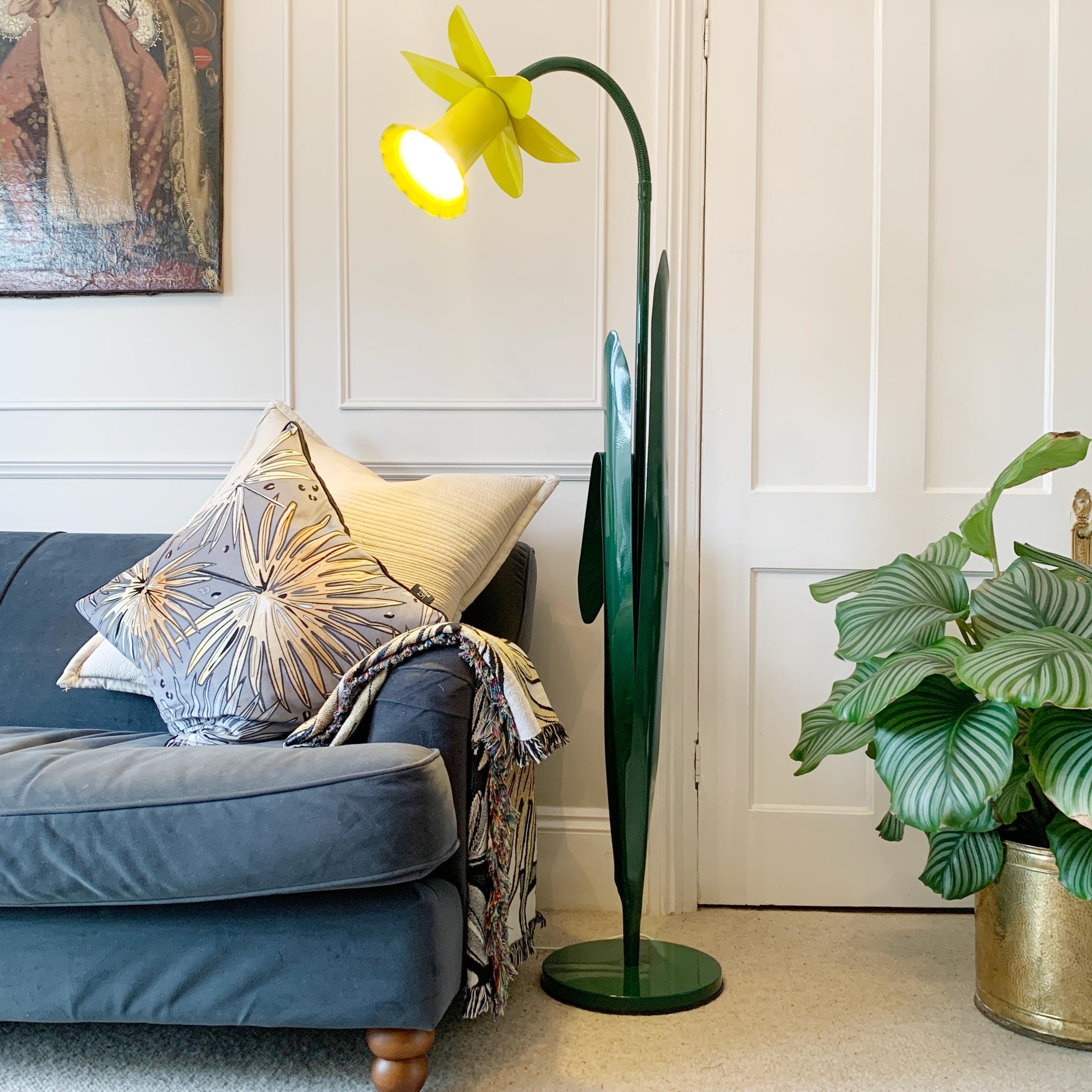 A very large and rare Bliss Daffodil floor lamp.

Iconic bright yellow Daffodil Floor Lamp designed by Mike Bliss 1985. This adjustable neck designer lamp in painted steel is from the UK and is in exceptional condition. 

Original manufacturers