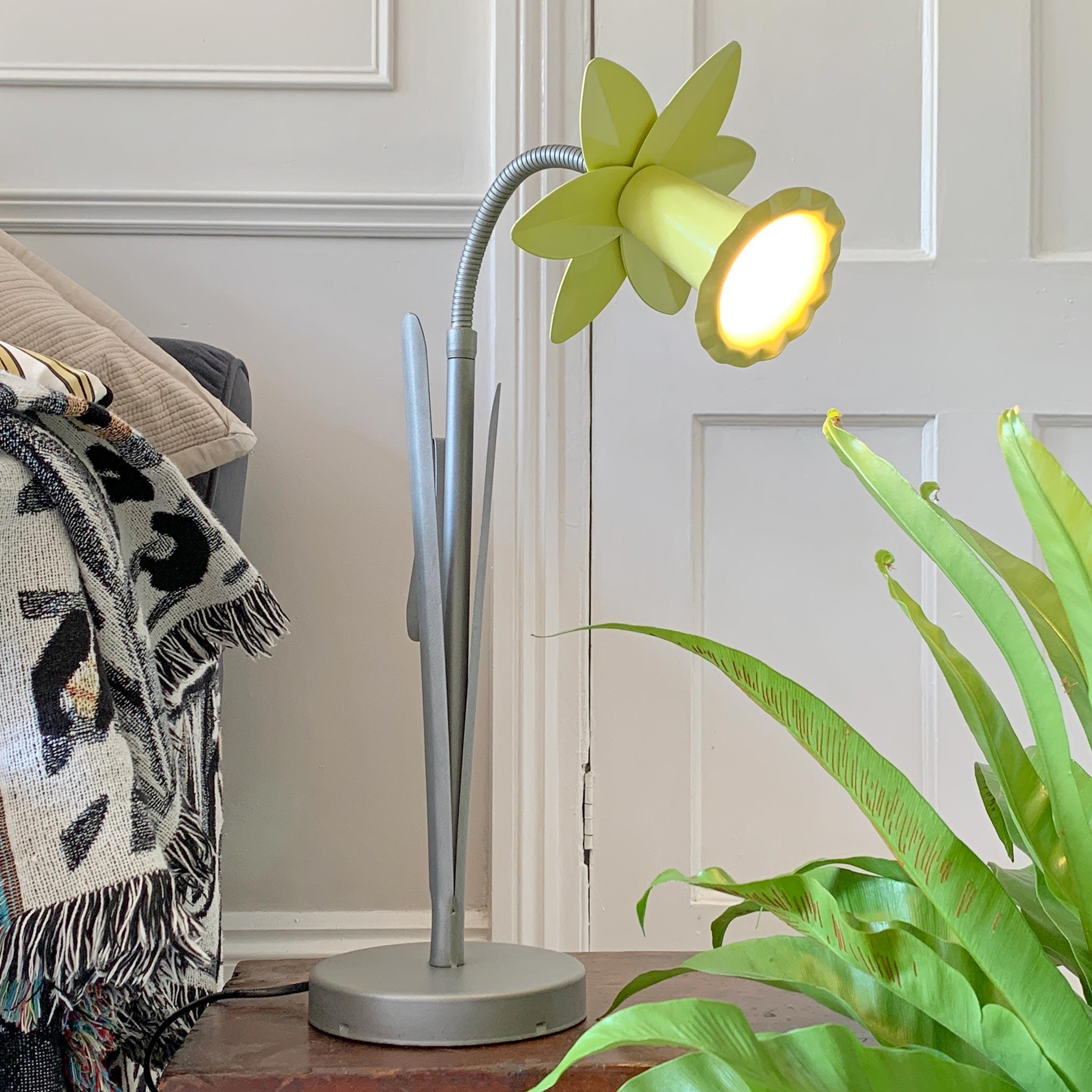 Iconic 'Bliss' designer daffodil table lamp
Sherbet lemon yellow metal daffodil shaped lamp with silver leaves, designed in the UK by Bliss in the 1980s
This rare example is in great condition

Measures: 55cm height (as shown in photograph) 69cm