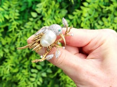 Blister Pearl Emerald 0.70 Carat Diamond and 14k Gold Bird Brooch Circa 1930