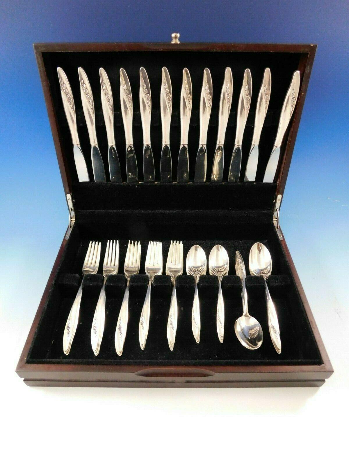 Stunning Blithe Spirit by Gorham sterling silver flatware set, 60 pieces. This set includes:

12 knives, 9 1/4