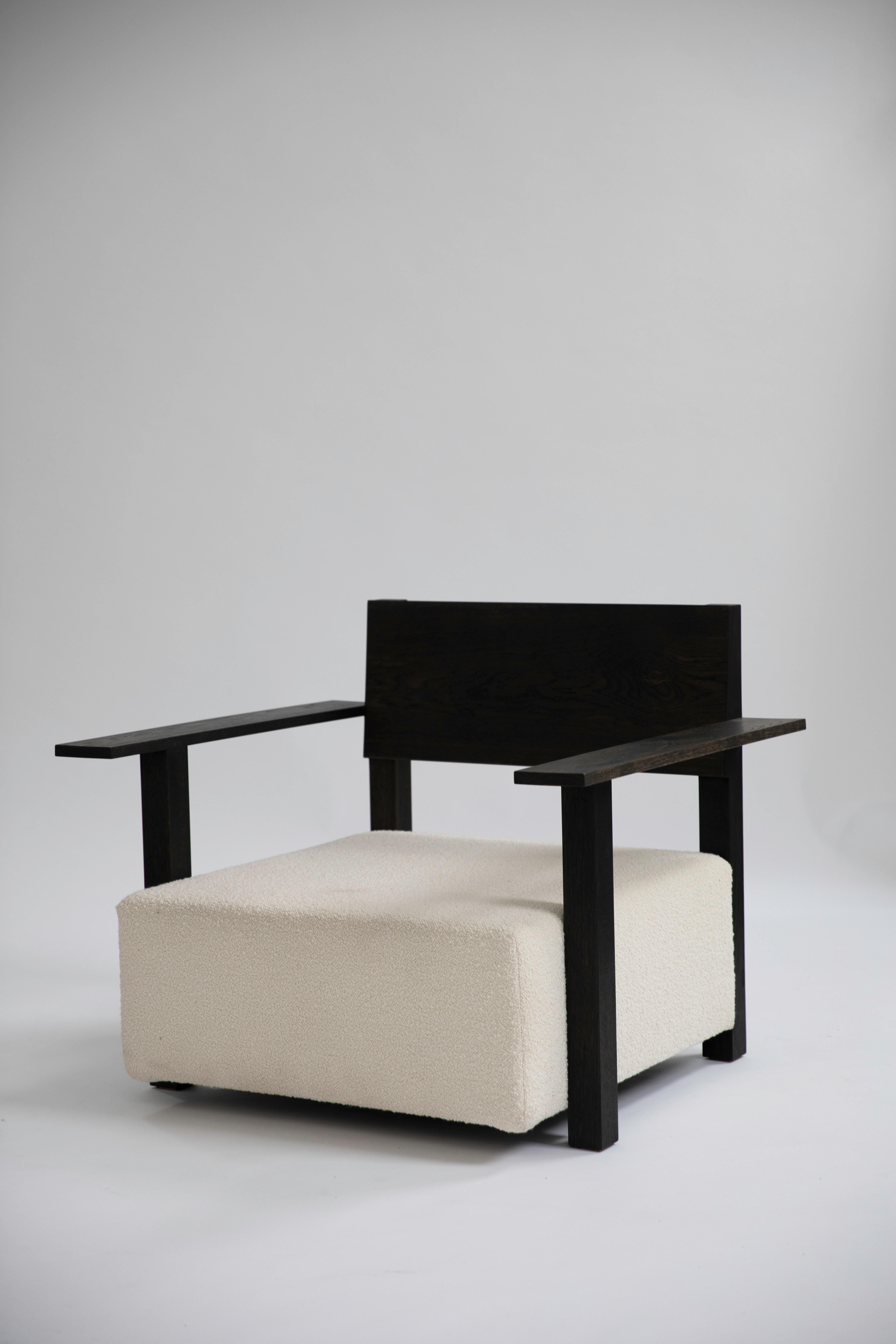 Block armchair by Fred Rigby Studio.
Dimensions: D 80 x W 100 x H 85 cm.
Materials: wood, bouclé.

Fred Rigby Studio is a London-based furniture and interior design practice founded by Fred Rigby in 2008. The independent studio works across