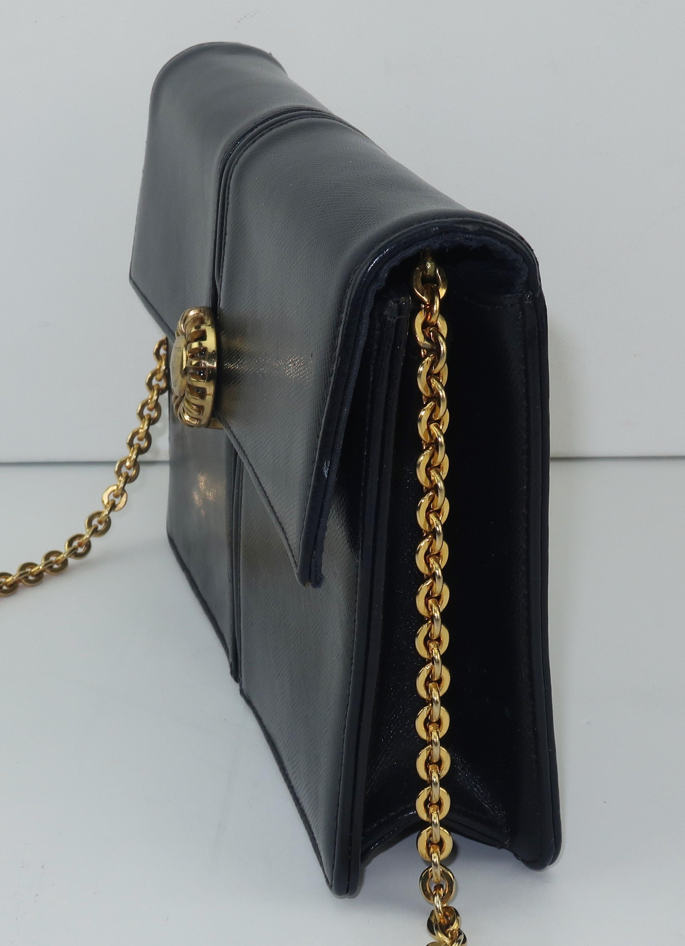 black leather handbag with chain strap