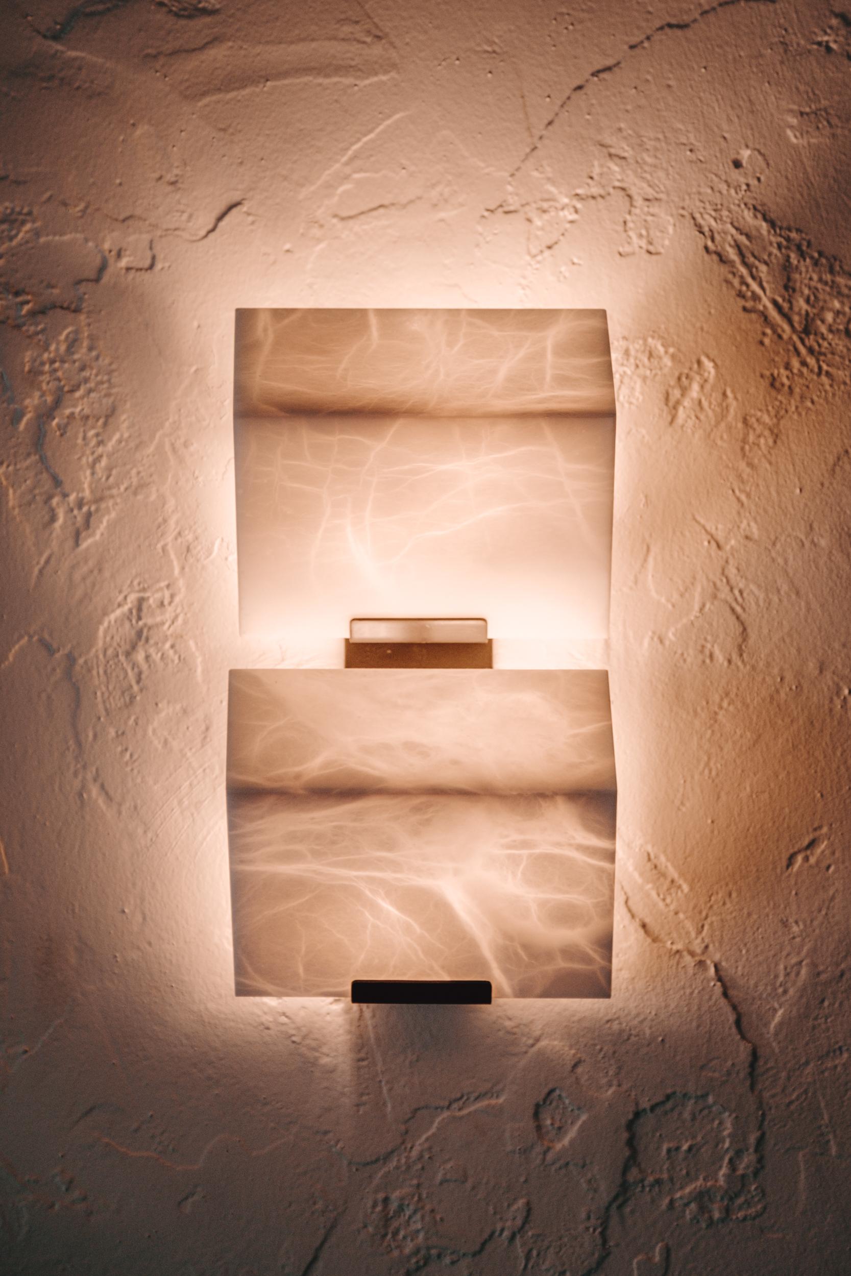 'Block Double' Model #185 alabaster sconce in the manner of Pierre Chareau. 

Handcrafted in Los Angeles in the workshop of noted French designer and antiques dealer Denis de le Mesiere, who meticulously pays homage to the work of Pierre Chareau