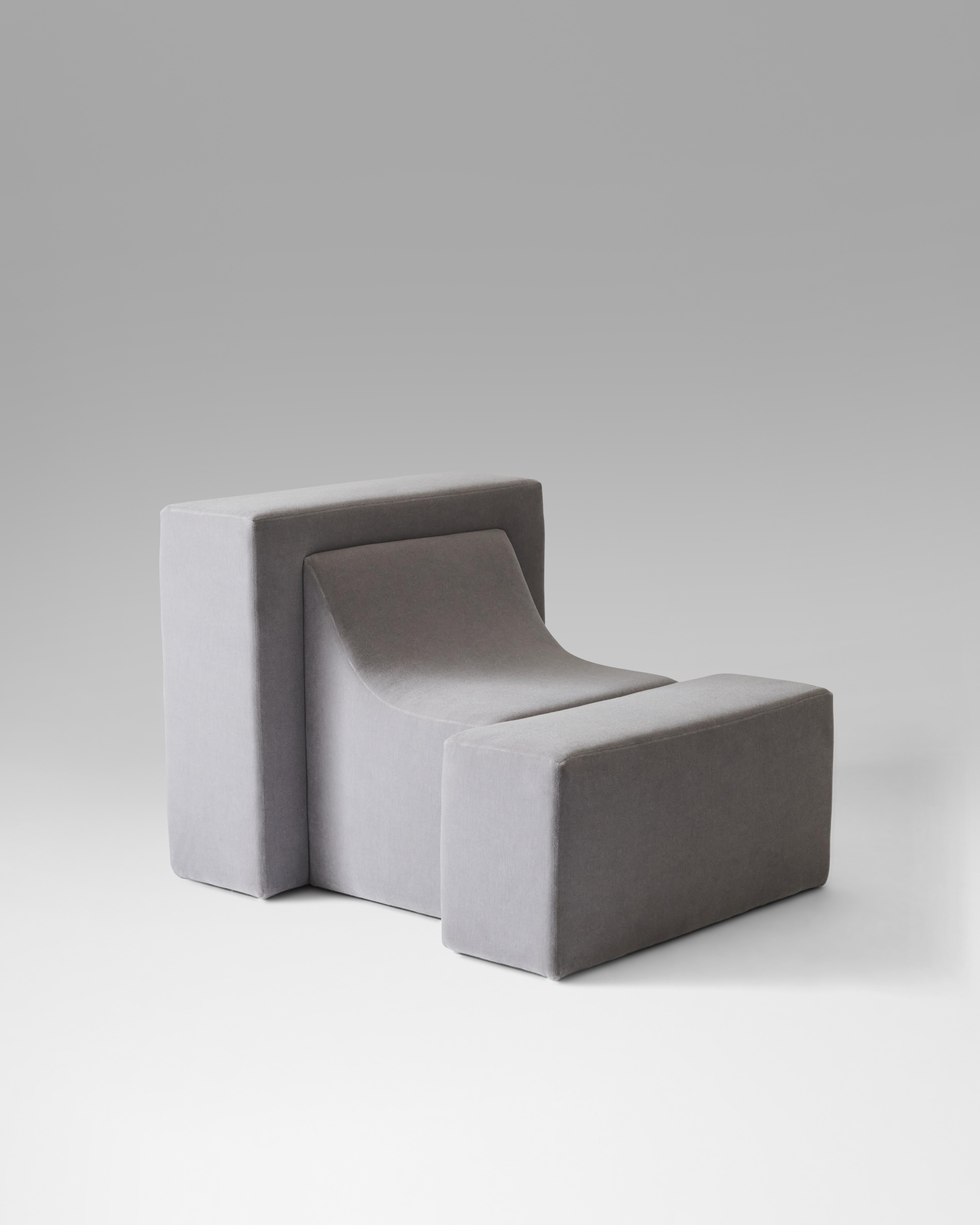 An assertive statement chair made from upholstered foam with a wooden core.

Upholstered in Maraham mohair. Can also be made in COM.



This piece is designed and handmade in Los Angeles, California.