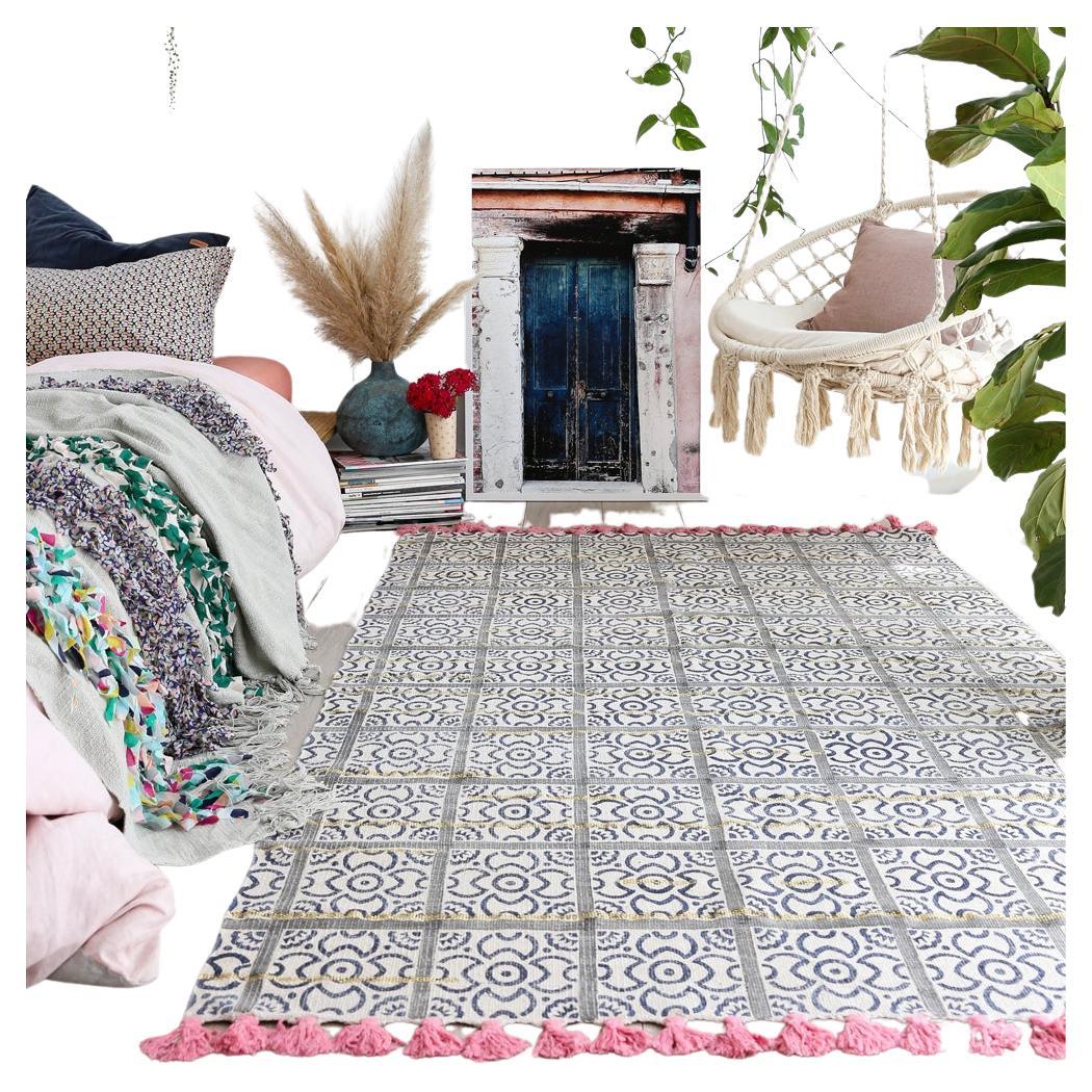 The stunning Zeppelin rug is brand new and features a beautiful block printed pattern on a base of rich cotton with a touch of gold lurex.

Colors are navy, and cream with pink tassels and the hint of gold.

The Zeppelin is one of our best selling