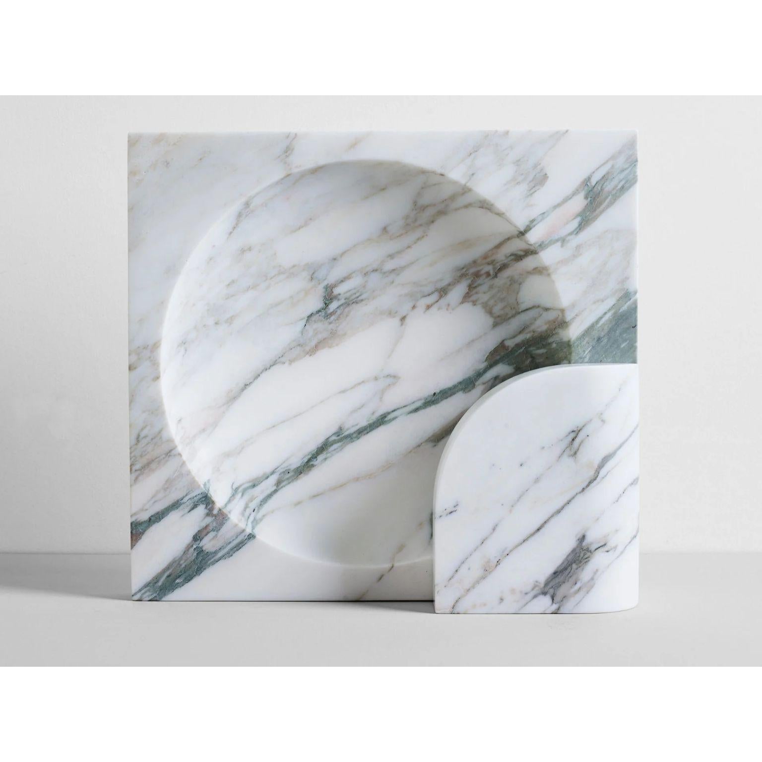 Calacatta Block Sconce by Henry Wilson
Dimensions: W 35 x D 11 x H 35 cm
Materials: Calacatta Marble

The Block Sconce in Calacatta Marble is a two piece stone light with captured bulb. Concealed mounting plate fixes the front and back pieces