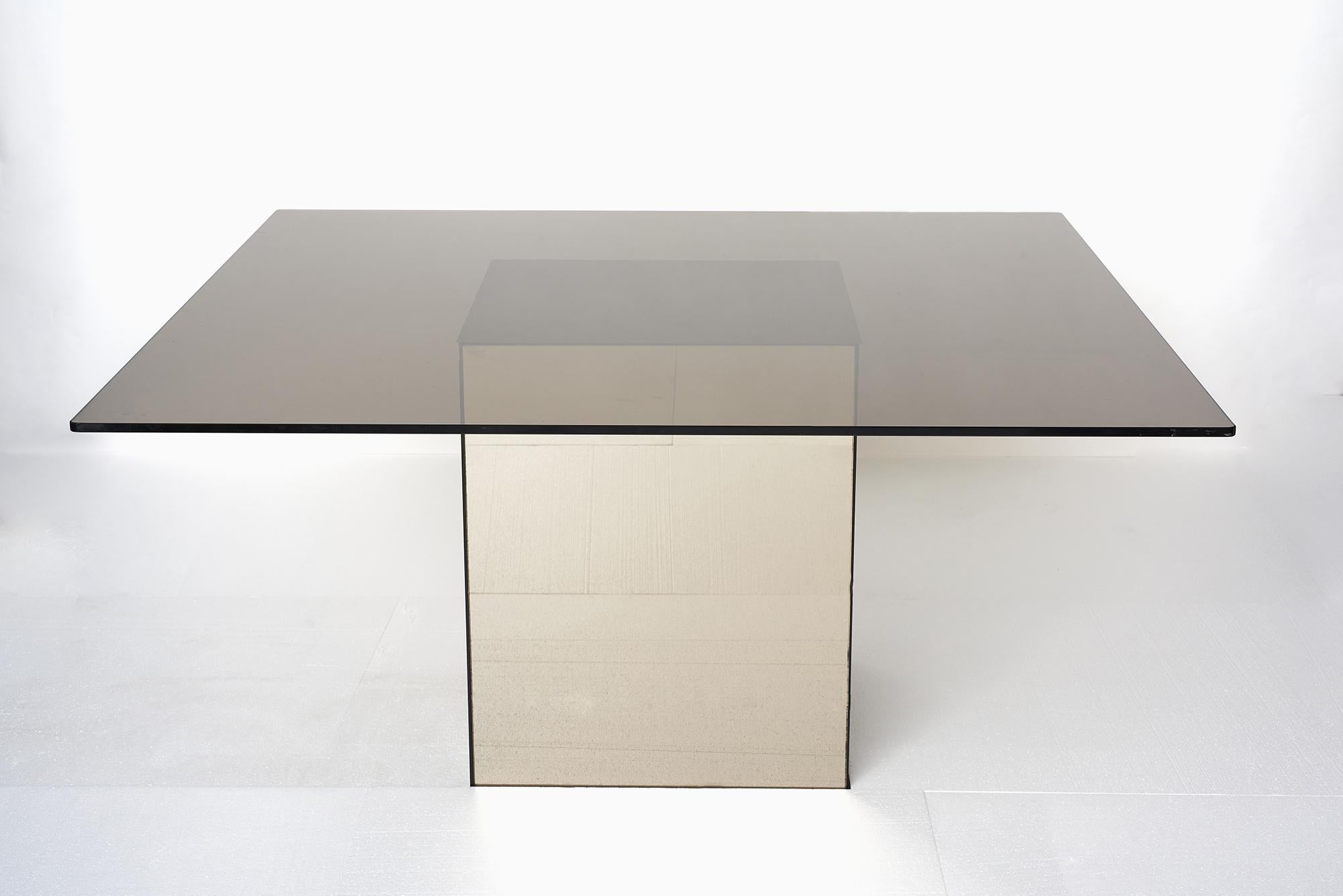 ‘Blok’ bronze mirror dining table designed by Nanda Vigo for Acerbis, Italy 1971.
Nanda Vigo’s work is interdisciplinary, combining art, design, architecture and the environment, and she was involved with numerous projects as an architect, designer