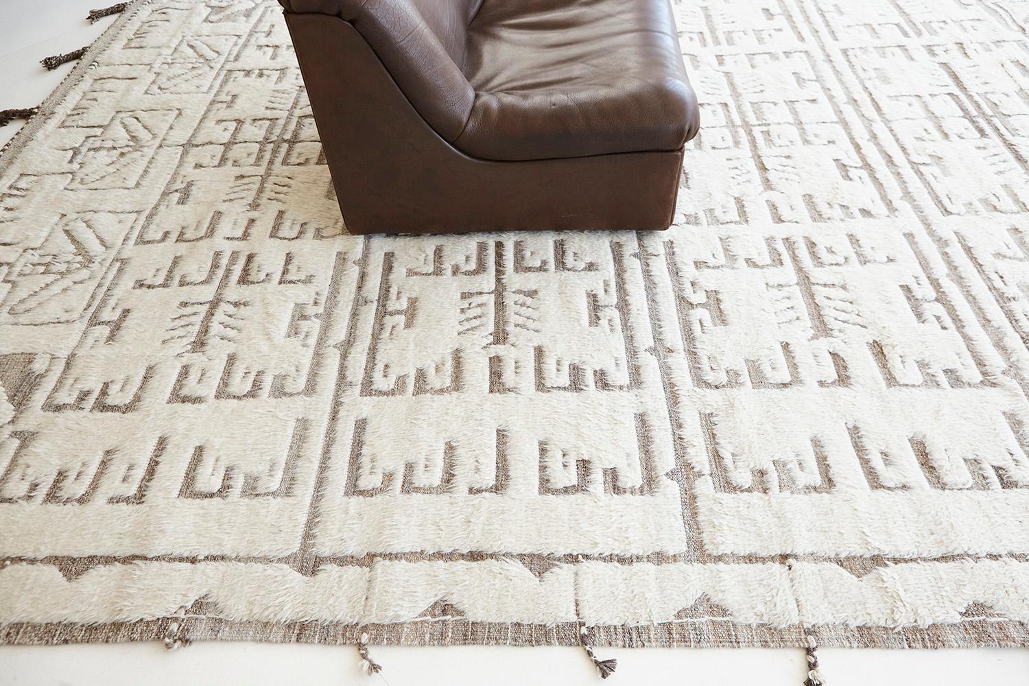 A mesmerizing rug that features a stunning natural colour scheme displaying an array of wonderful symbolical motifs. Cedar brown and ivory play an integral part in illuminating the rug’s overall majestic appearance. This collection, 'Kust' also