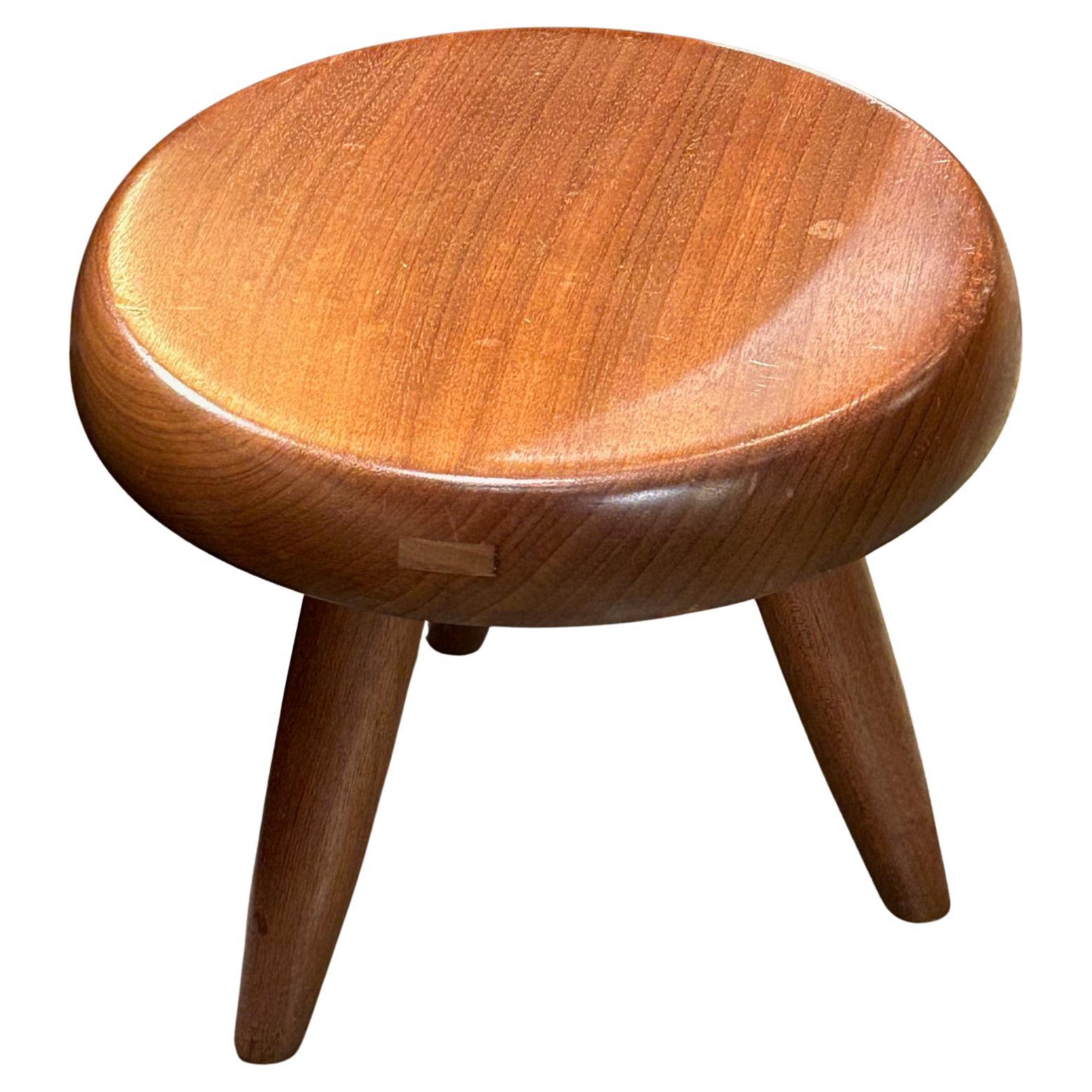 Blond mahogany stool by Charlotte Perriand For Sale