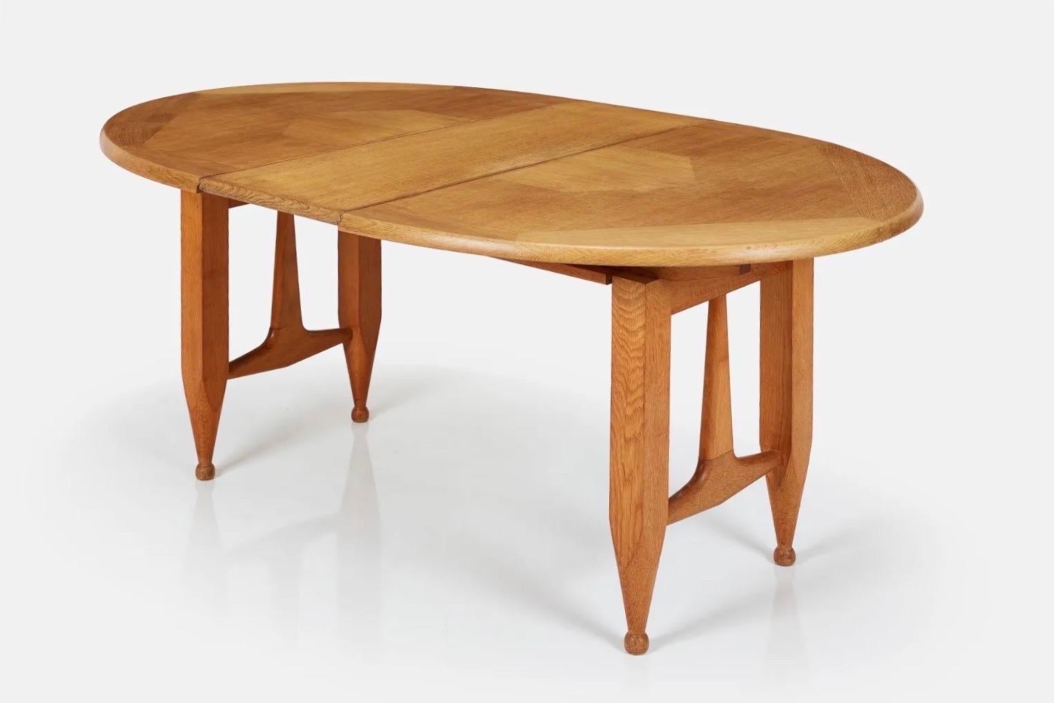 French Blond oak center table or dining table by Guillerme & Chambron for Votre Maison For Sale