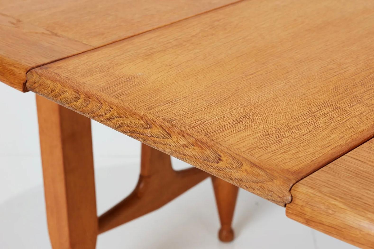 Blond oak center table or dining table by Guillerme & Chambron for Votre Maison For Sale 1