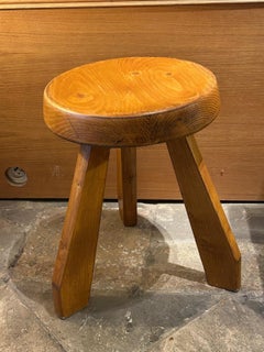 Blond pin "Sandoz" stool by Charlotte Perriand