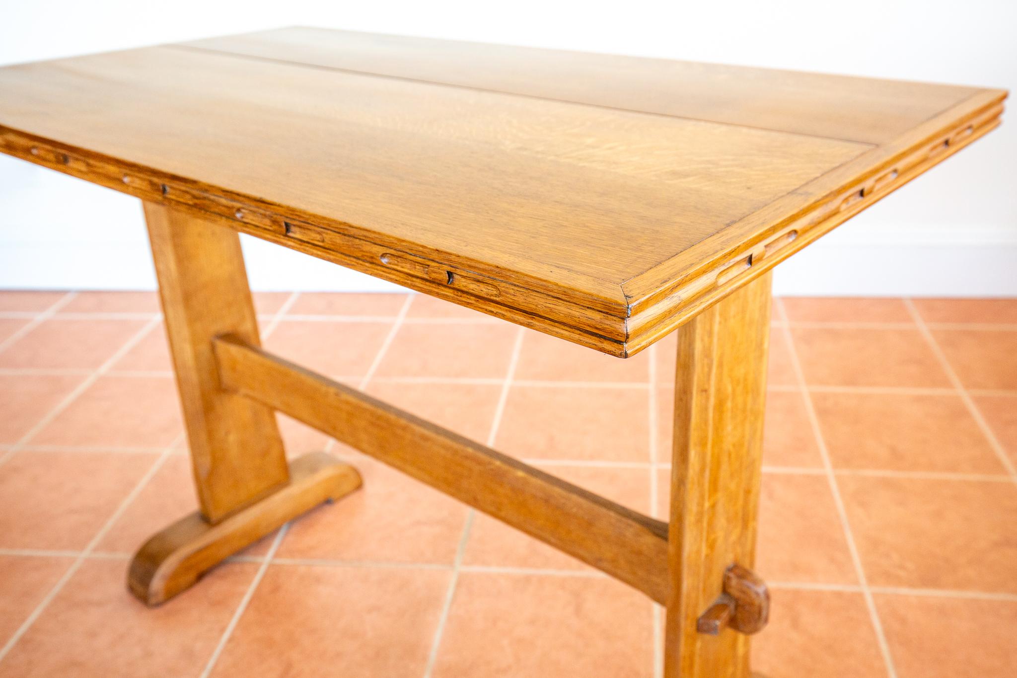 A gorgeous, interesting, and very rare light oak Arts & Crafts refectory trestle table in lovely antique condition. Strikingly attractive, beautifully crafted and extremely versatile, this super table makes a lovely smaller dining table, a larger