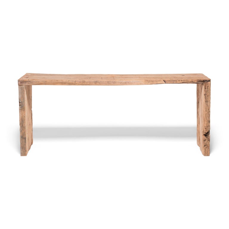 Made of wood reclaimed from Qing-dynasty architecture, this contemporary altar table is a celebration of wabi-sabi style. The clean lines highlight every knot, split, groove, and color variation in our expressive 18th-century elmwood timbers.

Table