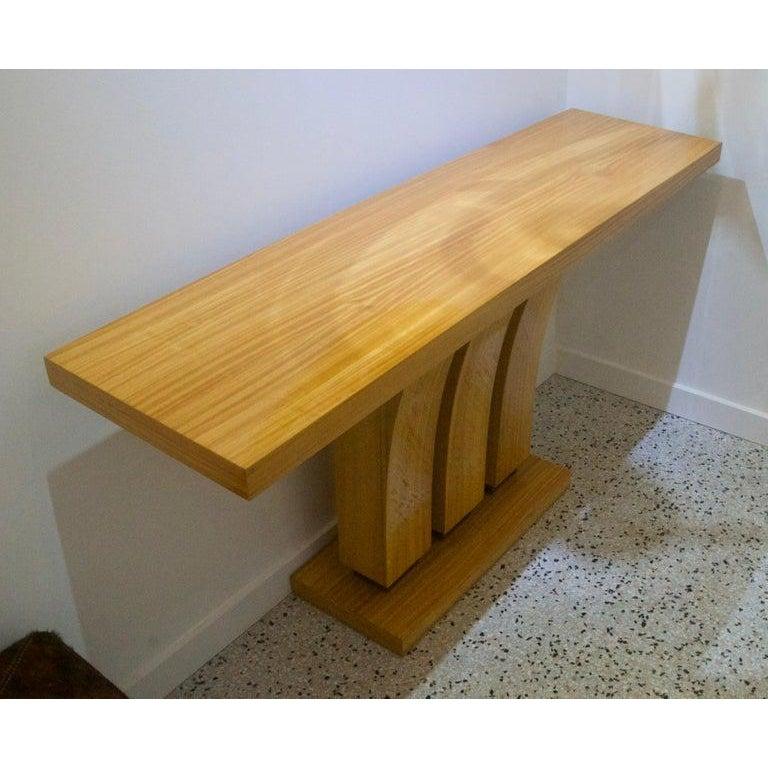 Karl Springer style console table Art Deco Blonde satinwood from a Palm Beach estate.

This stylish Art Deco inspired console table in the manner of Karl Springer is fabricated in satinwood with a clear lacquer finish.