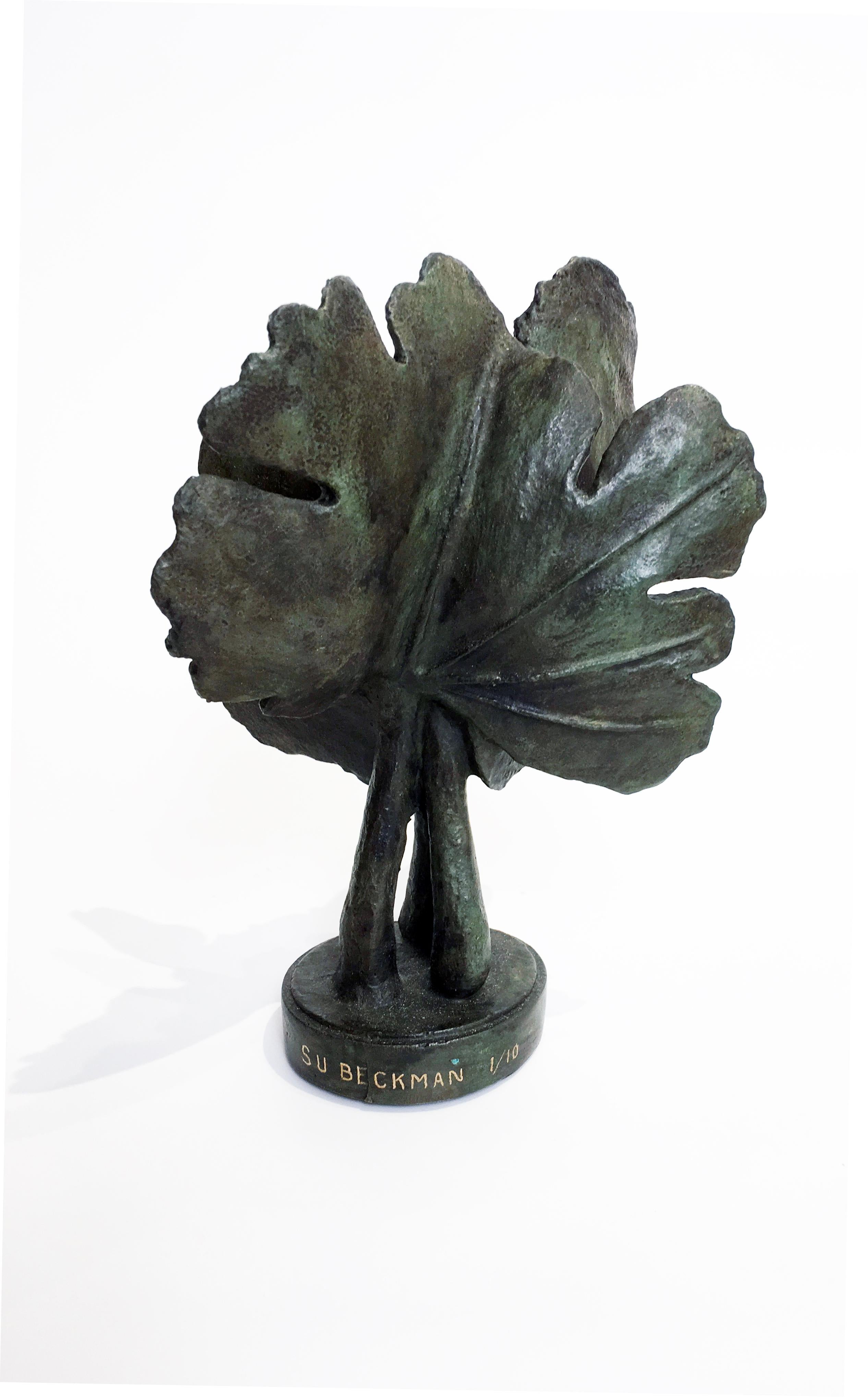 Bloodroot start to bloom before the foliage unfolds in early spring common in the upper Midwest of the United States. After blooming, the leaves unfurl to their full size as seen in this bronze sculpture by Sylvia Beckman. Made with the ancient lost