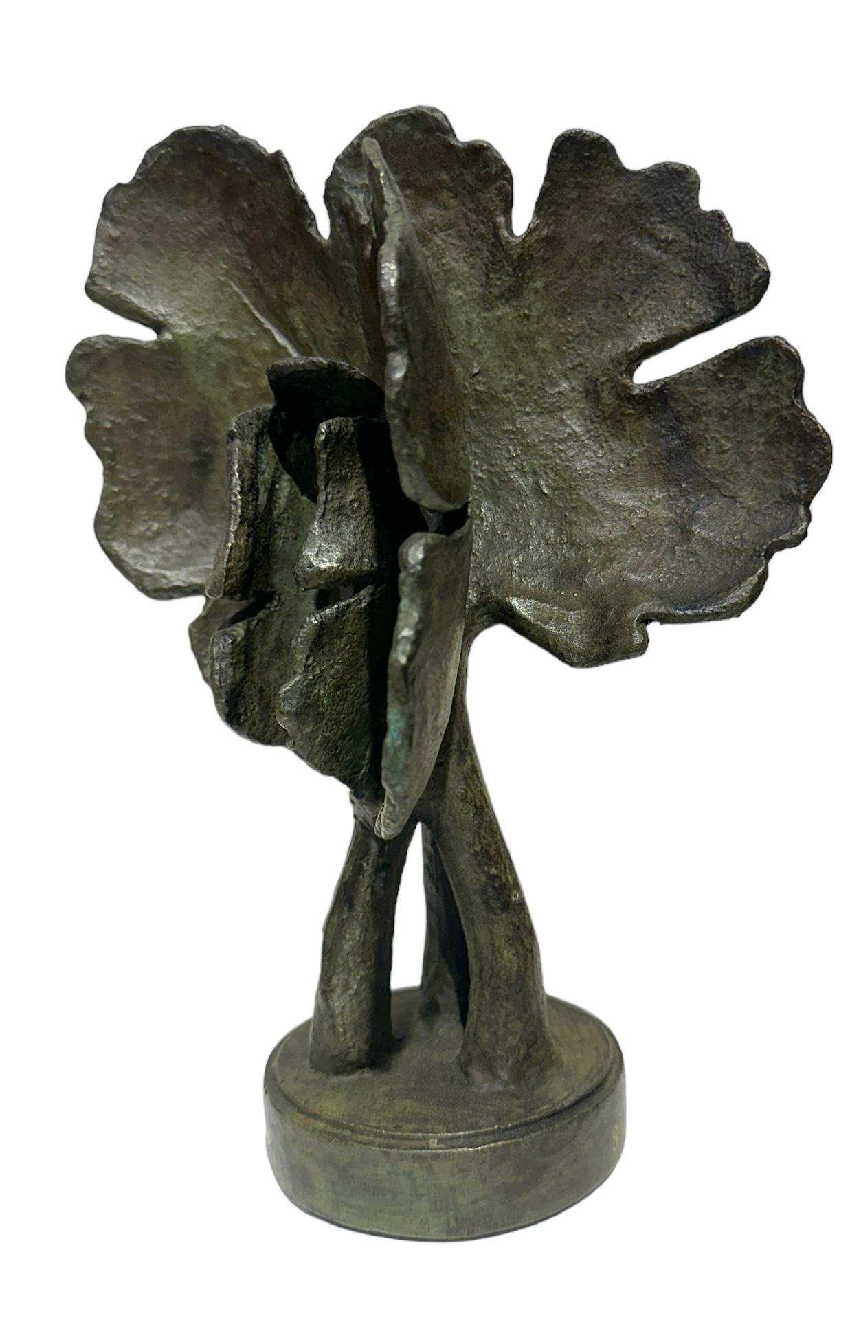 Bloodroot start to bloom before the foliage unfolds in early spring common in the upper Midwest of the United States. After blooming, the leaves unfurl to their full size as seen in this bronze sculpture by Sylvia Beckman. Made with the ancient lost
