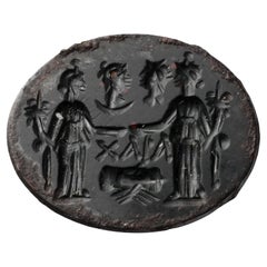 Bloodstone (heliotrope) intaglio: marriage scene. Roman, 2nd–3rd century A.D.