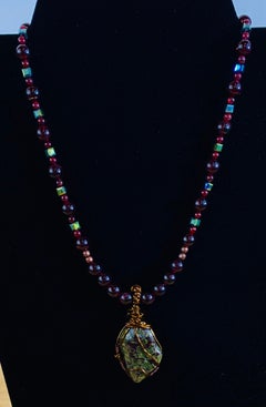 Ciondolo in pietra sanguigna con collana in rame anticato fatta a mano